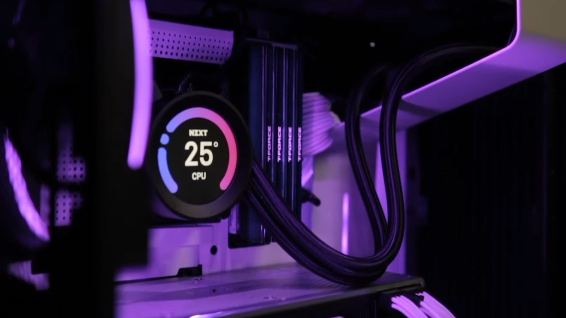 The NZXT Kraken Z63 AIO watercooler displaying the CPU temperature on its screen.