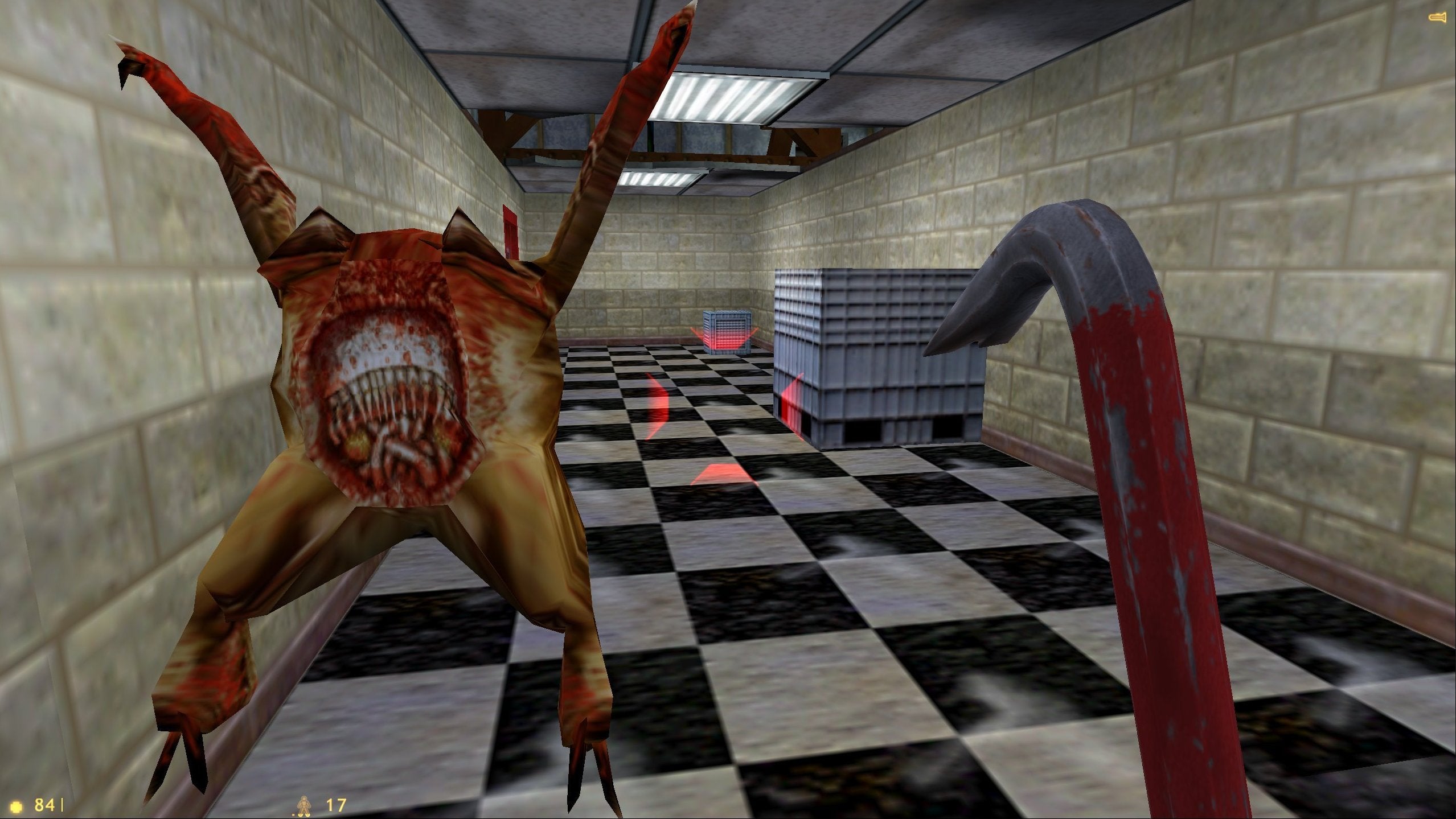 Half-Life: Gordon walks down a hall carrying his crowbar while a headcrab leaps through the air towards the camera with its mouth open.