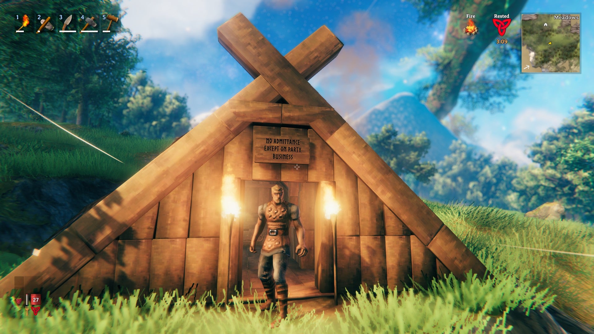 Valheim viking standing in front of a small wooden house