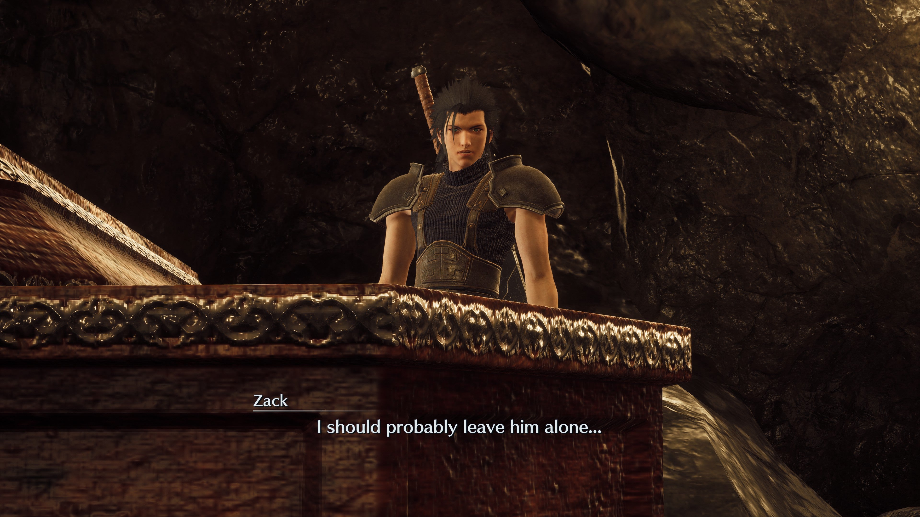 Zack looks down into a coffin in Crisis Core - Final Fantasy VII - Reunion, deciding to leave what's in there well alone.