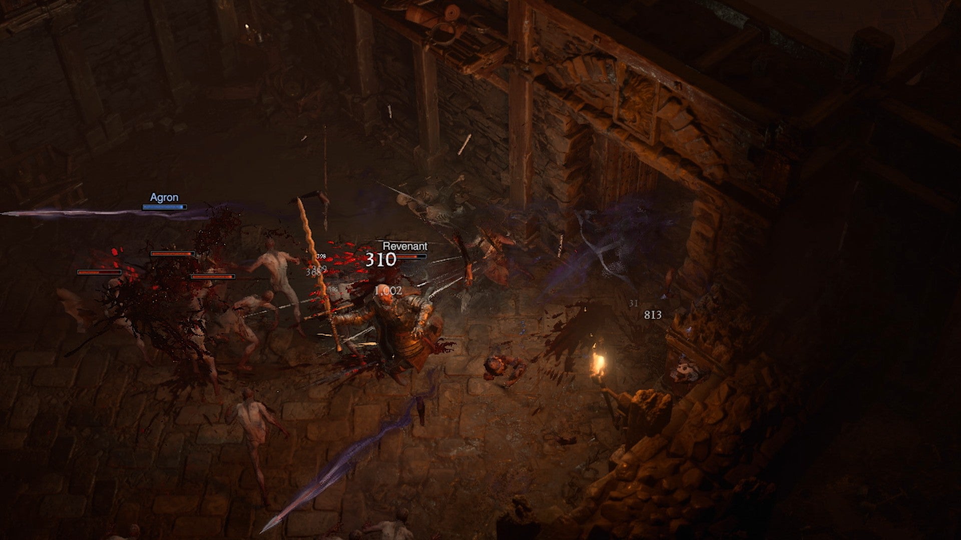 Un pícaro lucha contra demonios en una habitación oscura en Diablo 4.