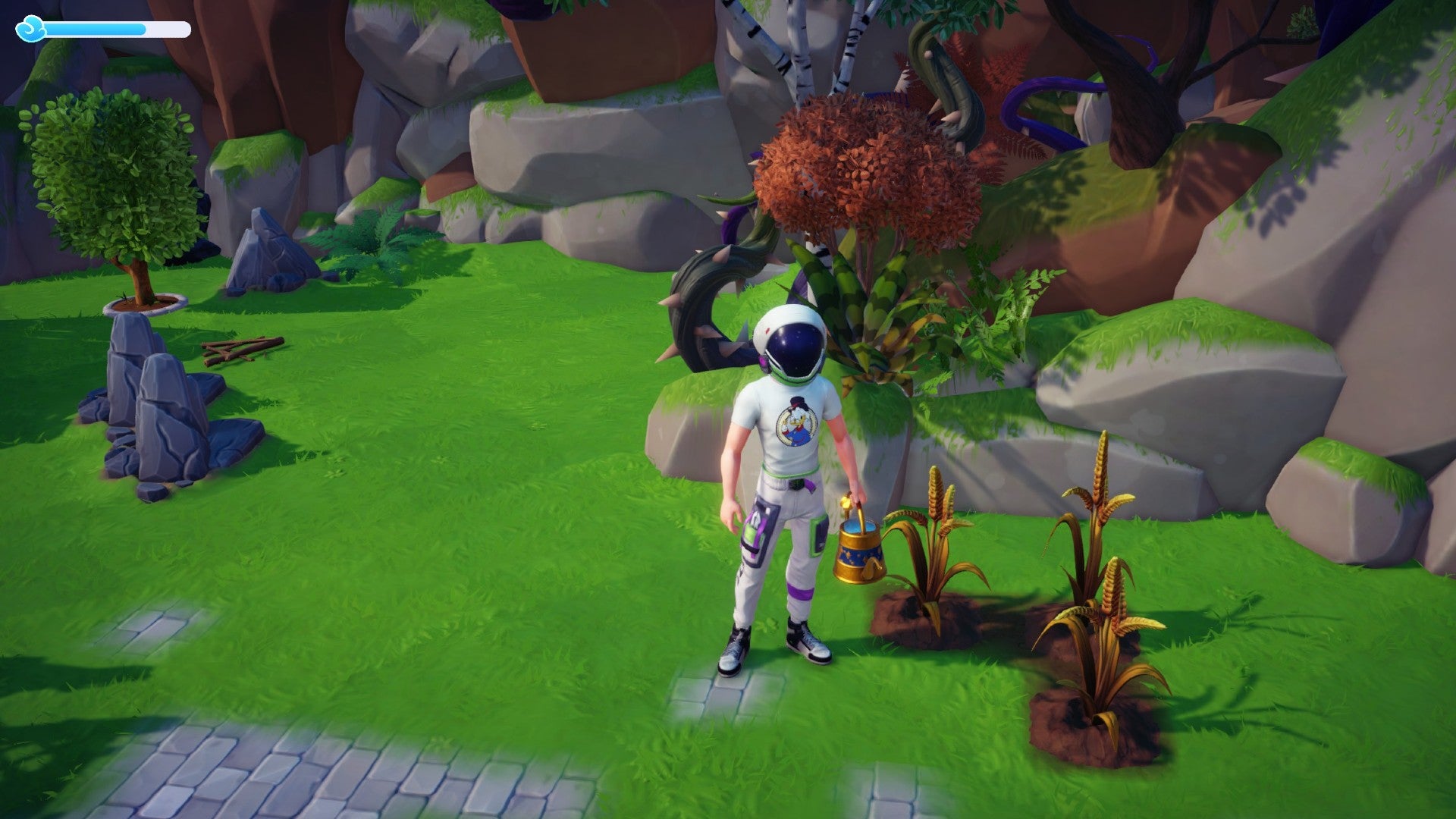 Disney Dreamlight Valley screenshot showing a character wearing a Buzz Lightyear helmet next to some wheat plants on a patch of grass beside a stone path.