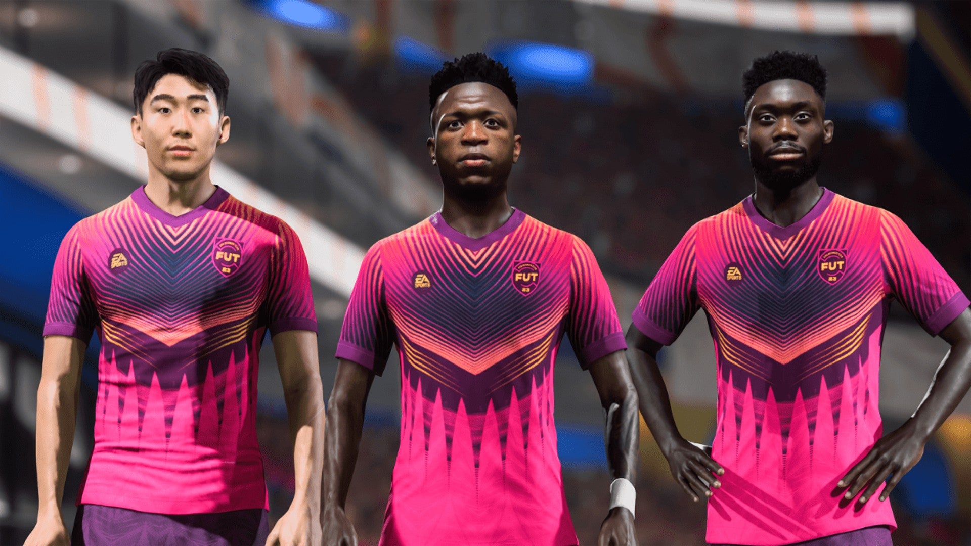 FIFA 23 image showing three players facing forward in a line, wearing vibrant pink Ultimate Team kits, with a blurred stadium behind them.