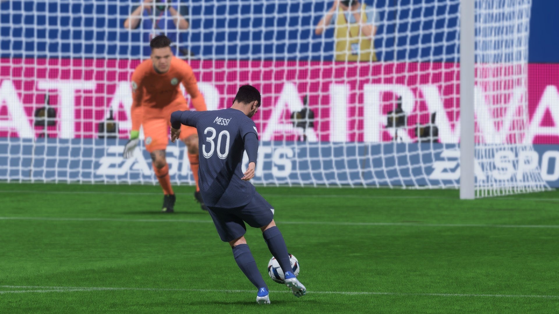 Messi taking a shot against the Man City goalkeeper in FIFA 23.