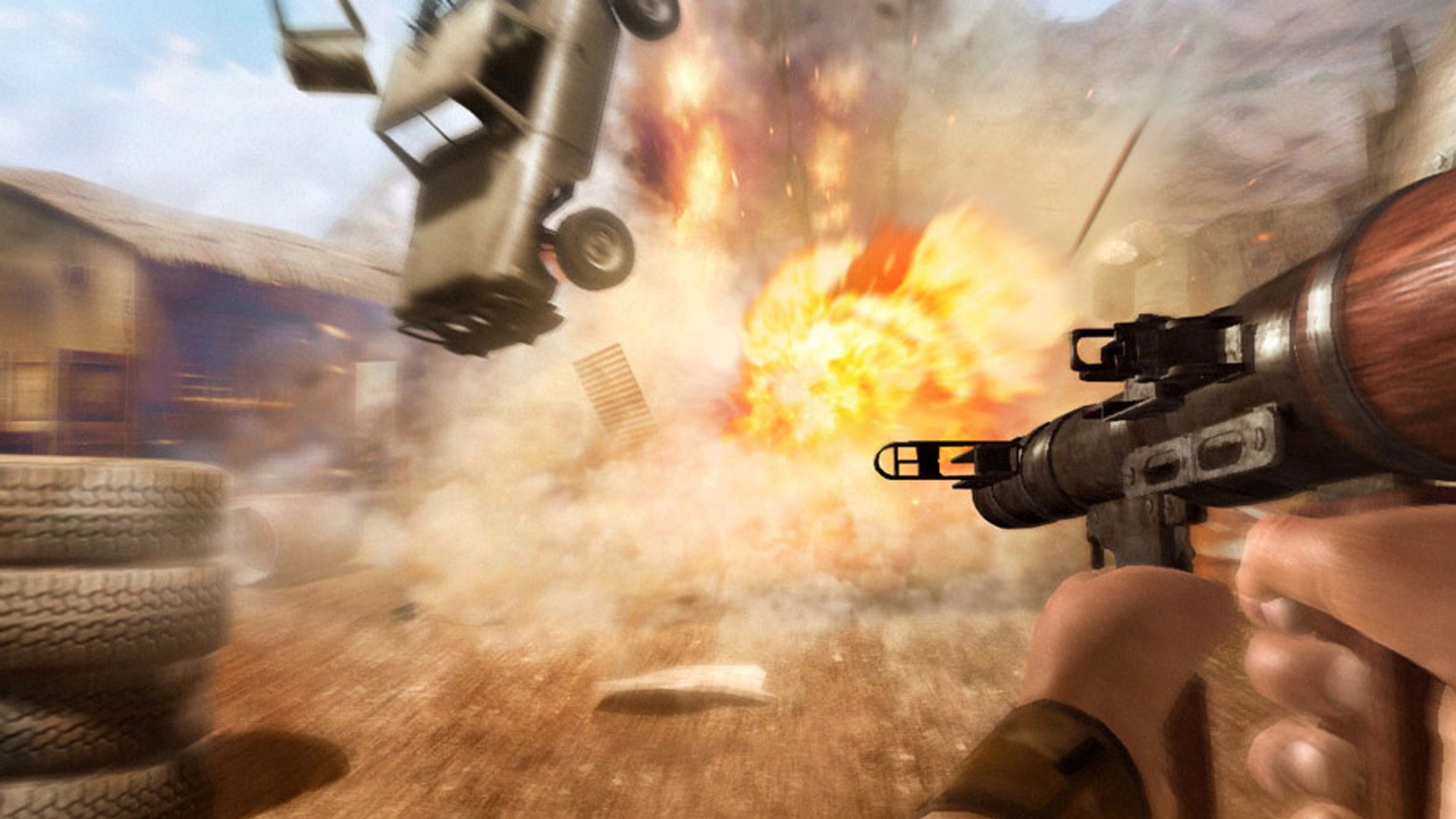 Far Cry 2 image showing a car getting thrown into the air by a fiery explosion, while the player holds an RPG.