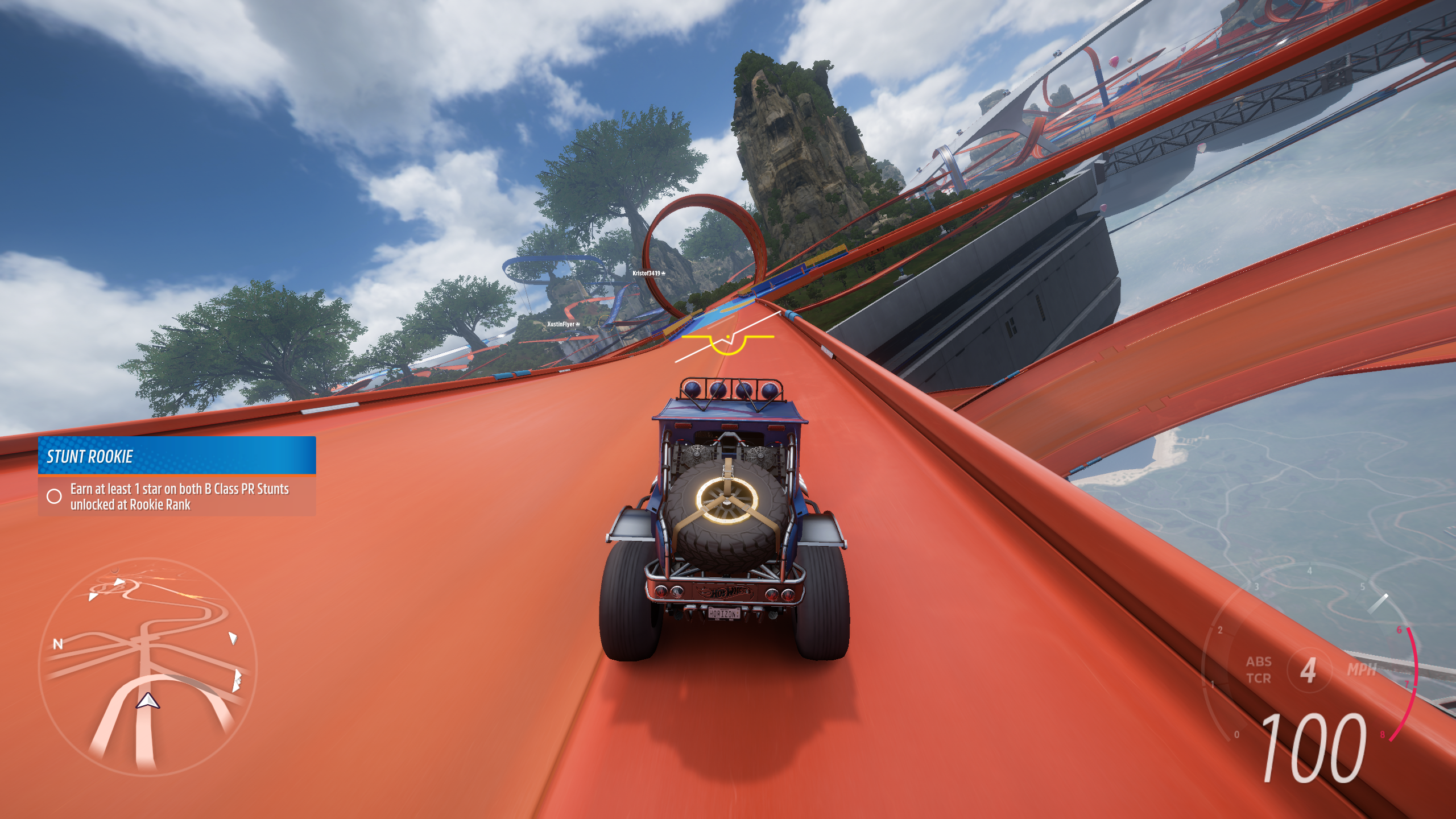 A truck races down a sharply angled track in the in the Forza Horizon 5 Hot Wheels expansion, showing the new roll indicator HUD element in action.