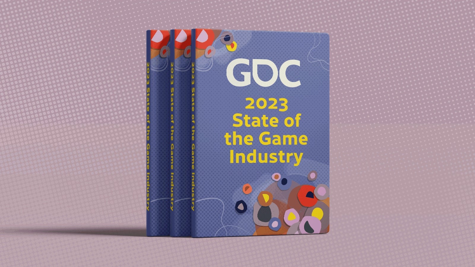 A photo of hard copies of the GDC State Of The Industry 2023 survey