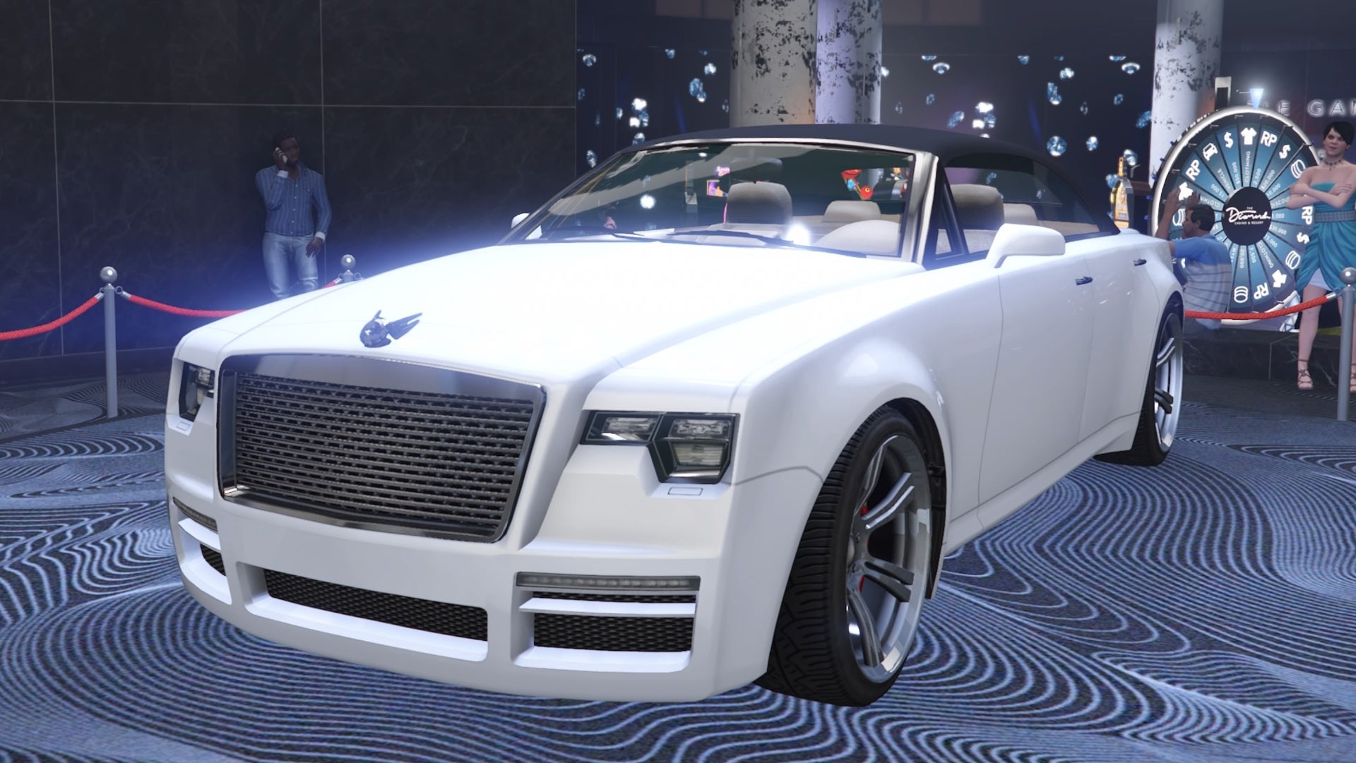 GTA Online, a white Enus Windsor Drop is parked on the podium in the middle of the Diamond Casino.