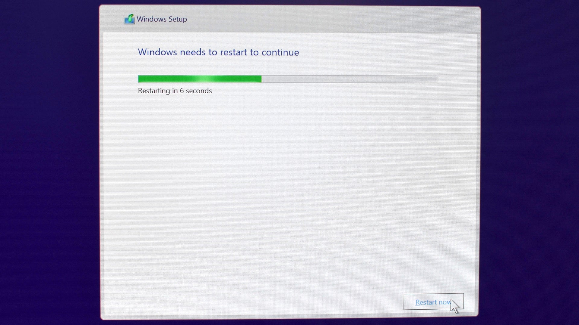 Paso 5 de cómo instalar Windows: espera el instalador.  Su PC se reiniciará sola.