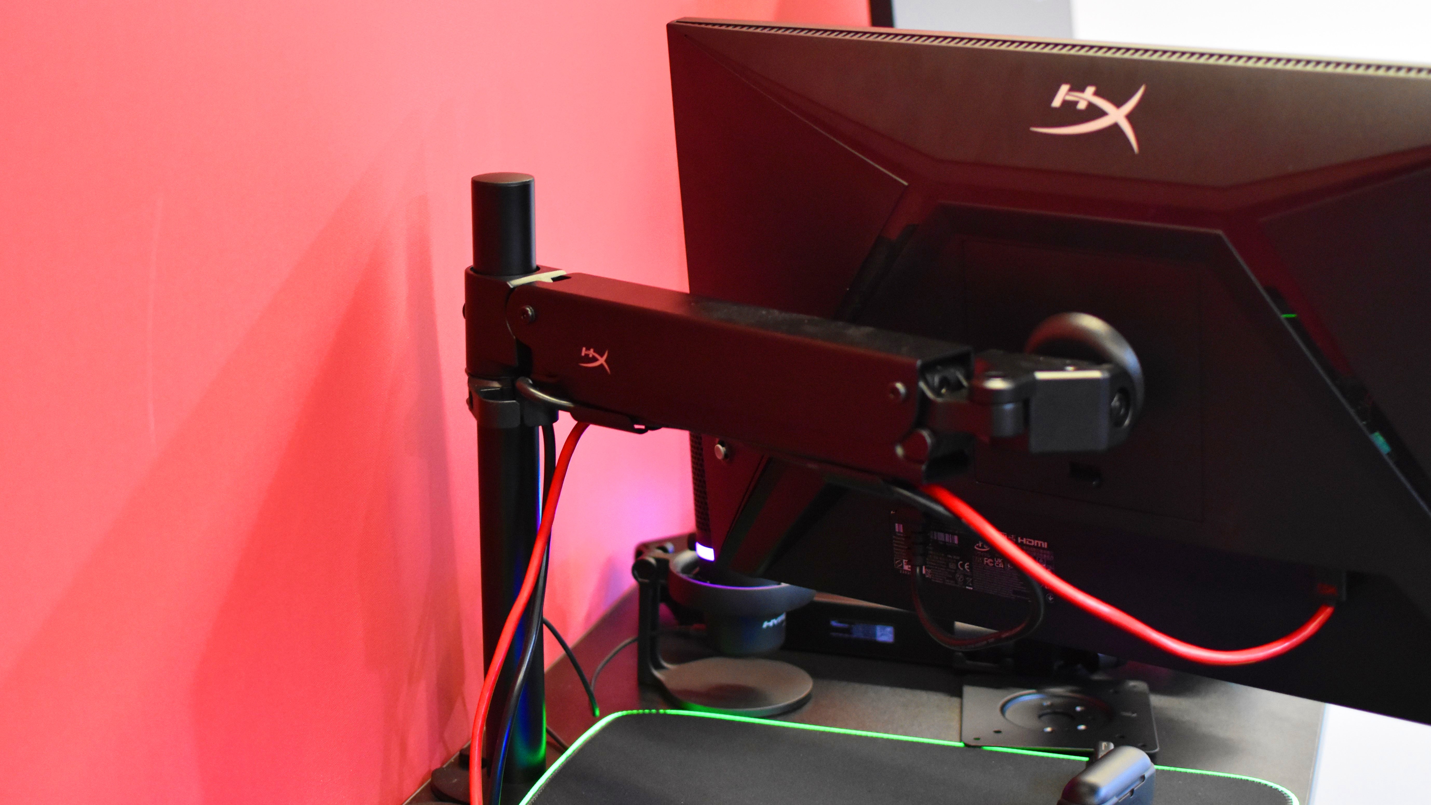 The HyperX Armada Gaming Mount holding up an Armada 27 gaming monitor.
