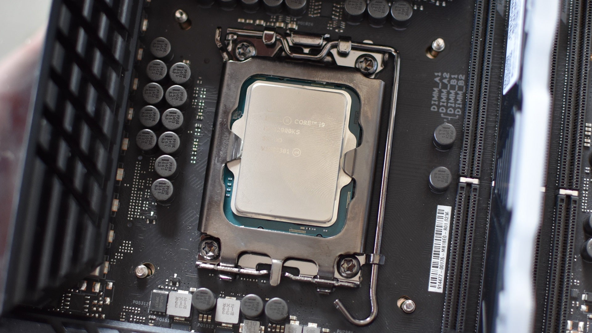 An Intel Core i9-12900KS CPU installed in a motherboard.