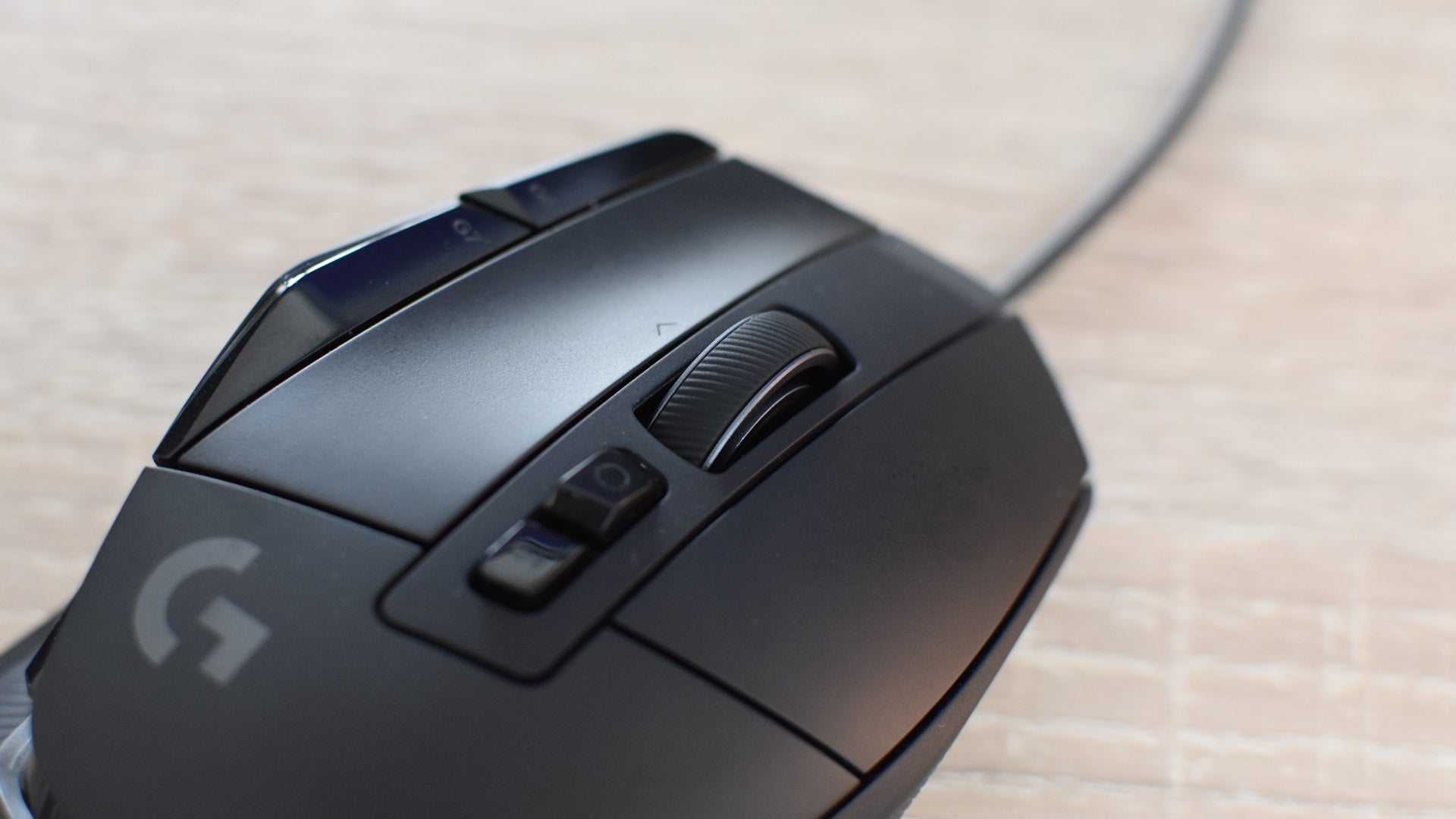 A closeup of the scroll wheel on the Logitech G502 X gaming mouse.