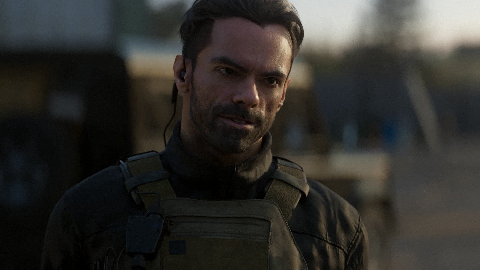 Modern Warfare 2 image showing Alejandro, with a blurred humvee in the background.