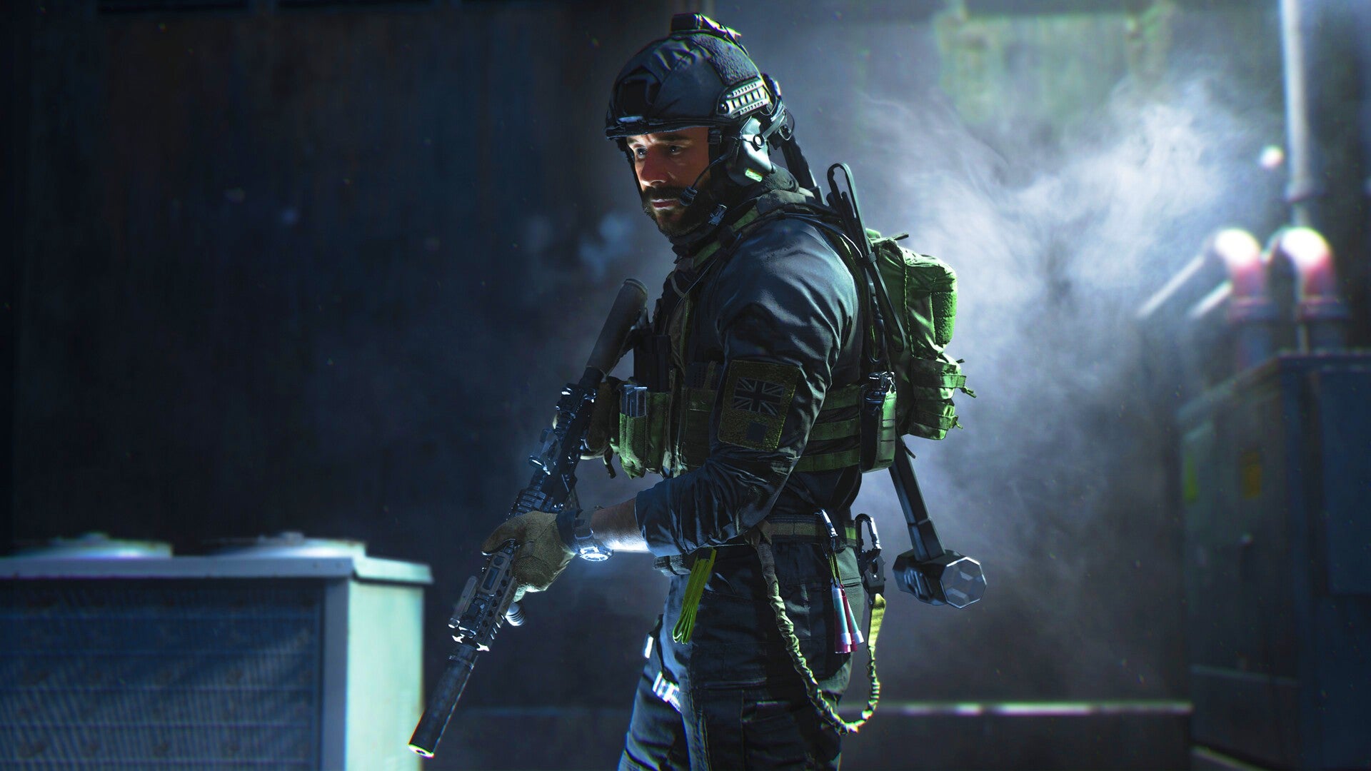 Modern Warfare 2 image showing Captain Price standing in a smoky room while holding an assault rifle.
