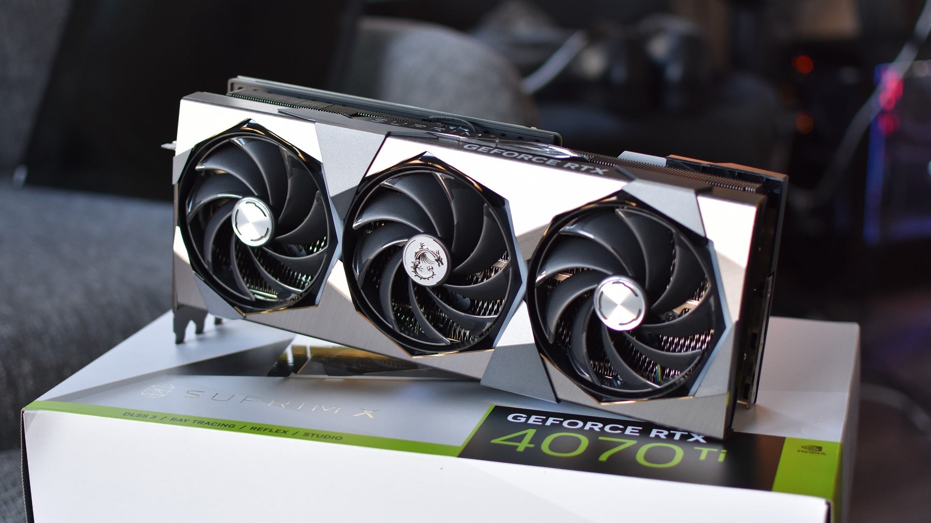 The triple-fan cooler on the MSI GeForce RTX 4070 Ti Suprim X 12G graphics card.