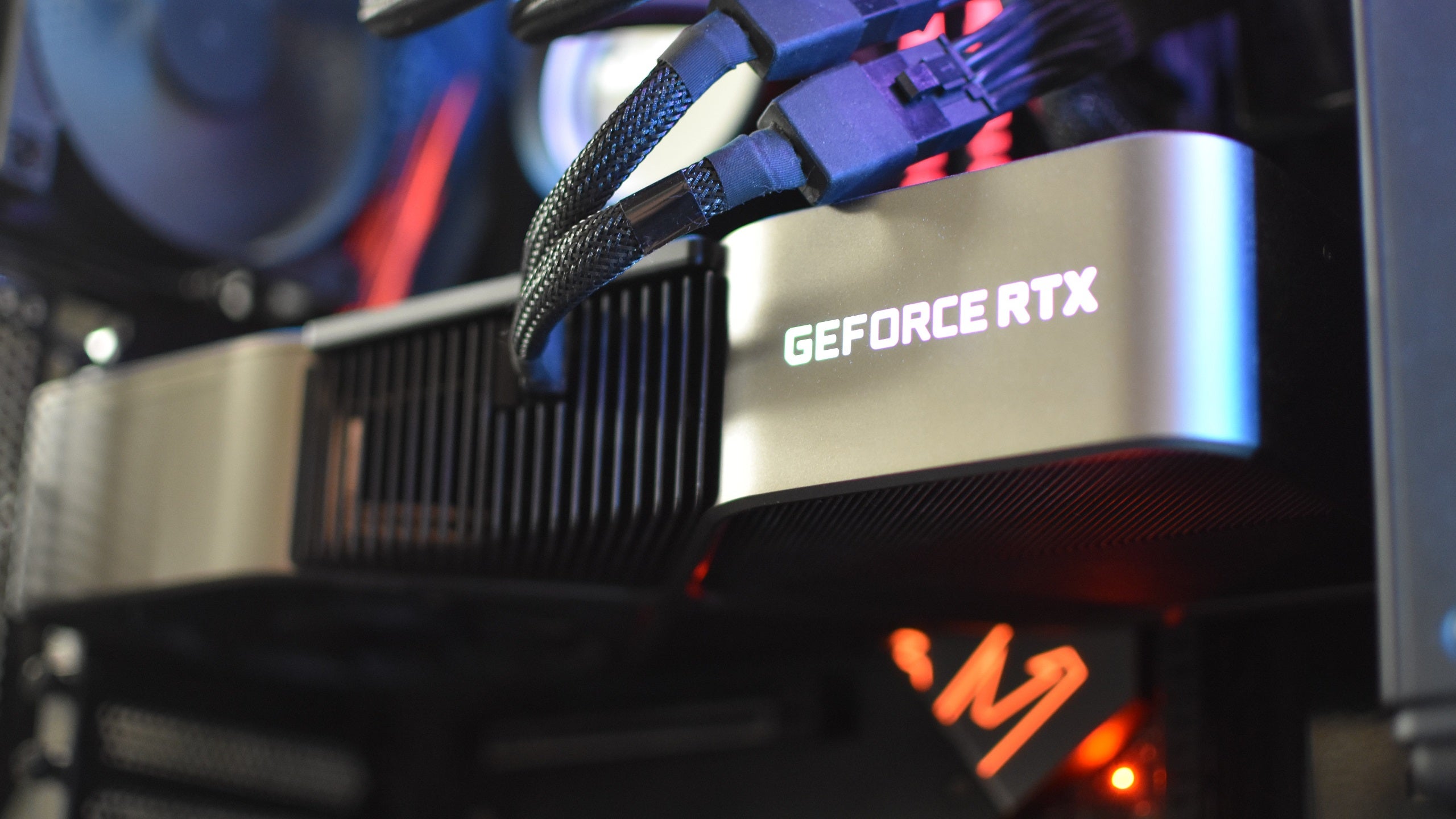 An Nvidia GeForce RTX 3090 graphics card, installed and running inside a PC.