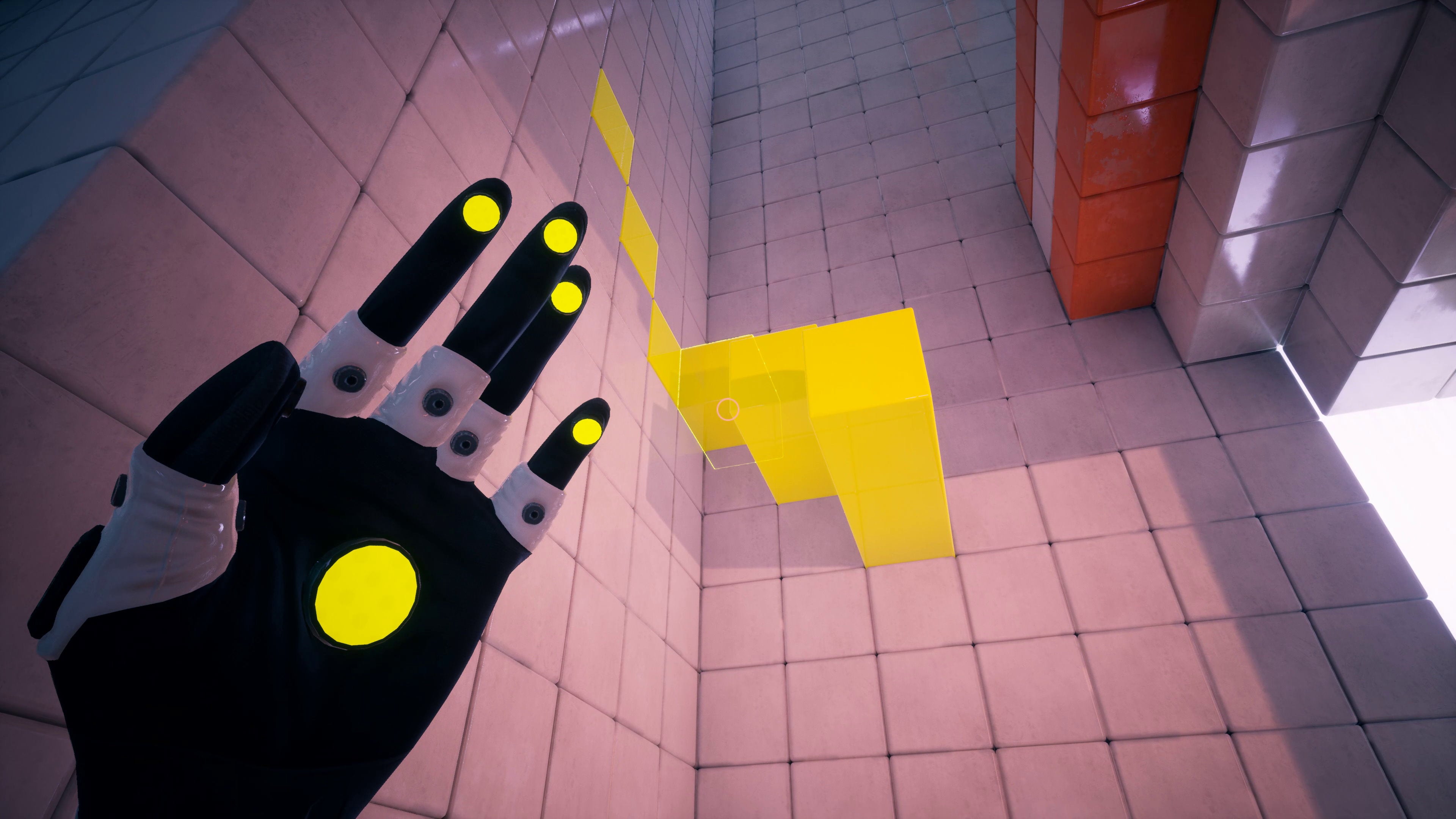 A glove reaches out toward a white wall and a bunch of yellow cubes in QUBE (2022).