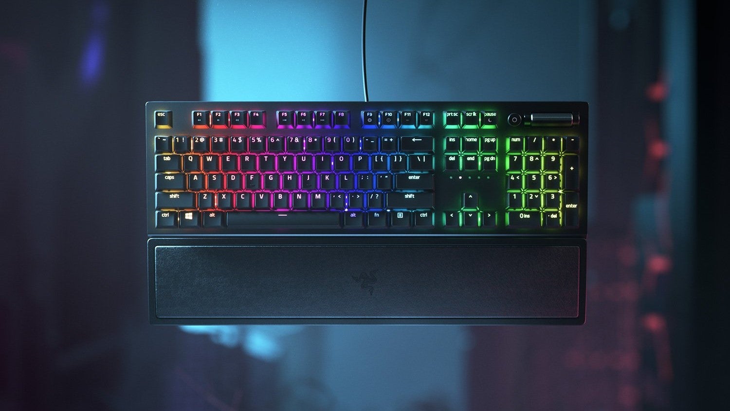 Razer BlackWidow V3 keyboard against a dark sci-fi background.
