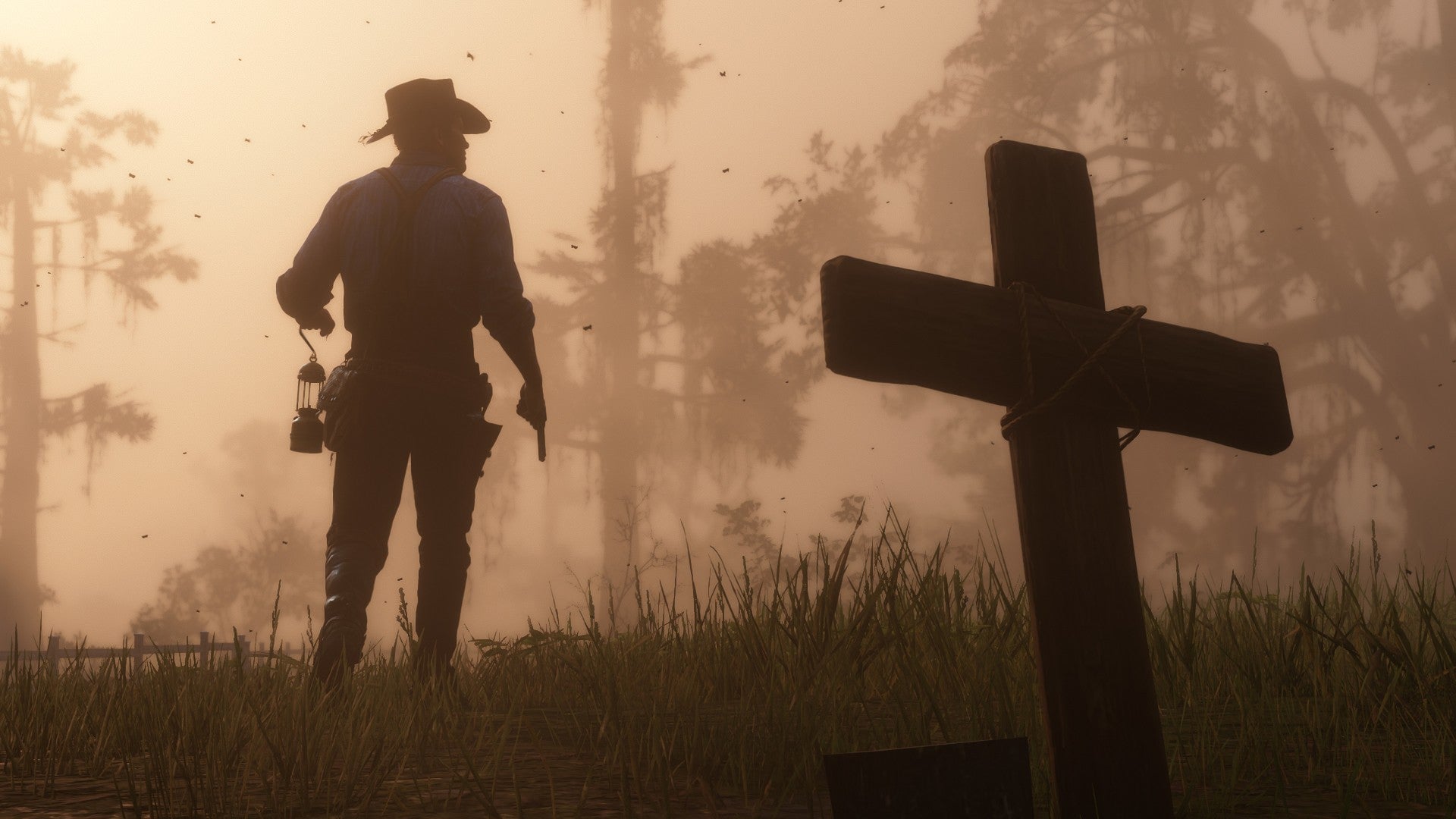 Red Dead Redemption 2 image showing Arthur Morgan holding a lantern at dusk next to a grave marker.