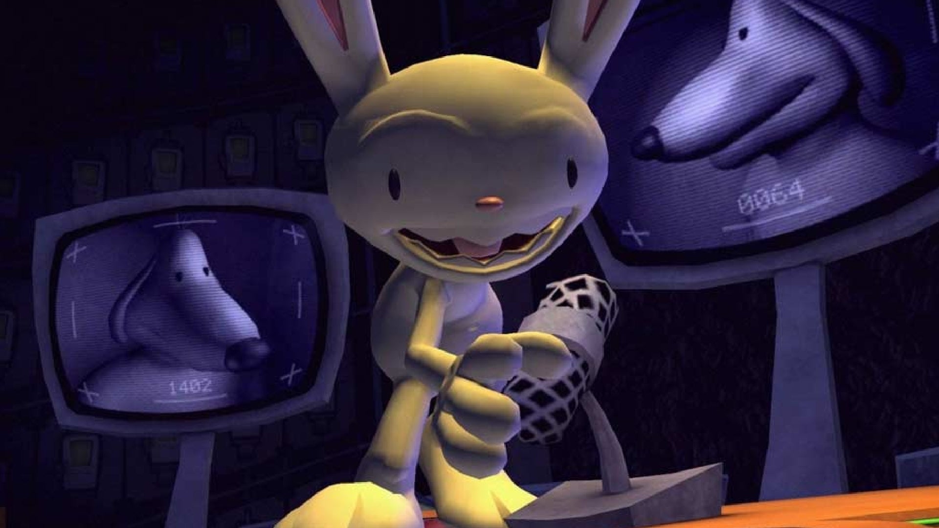 A screenshot from Sam & Max: The Devil's Playhouse showing Max looking surprised in front of monitors displaying Sam's head