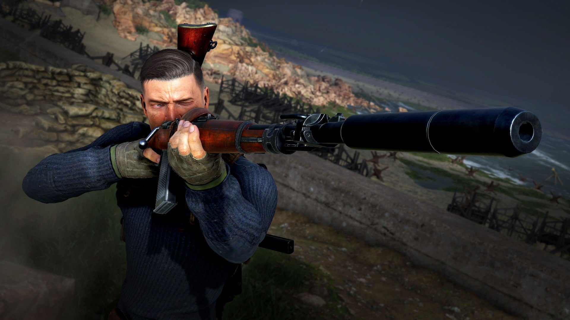 Sniper Elite's Karl Fairburne aims with a suppressed rifle
