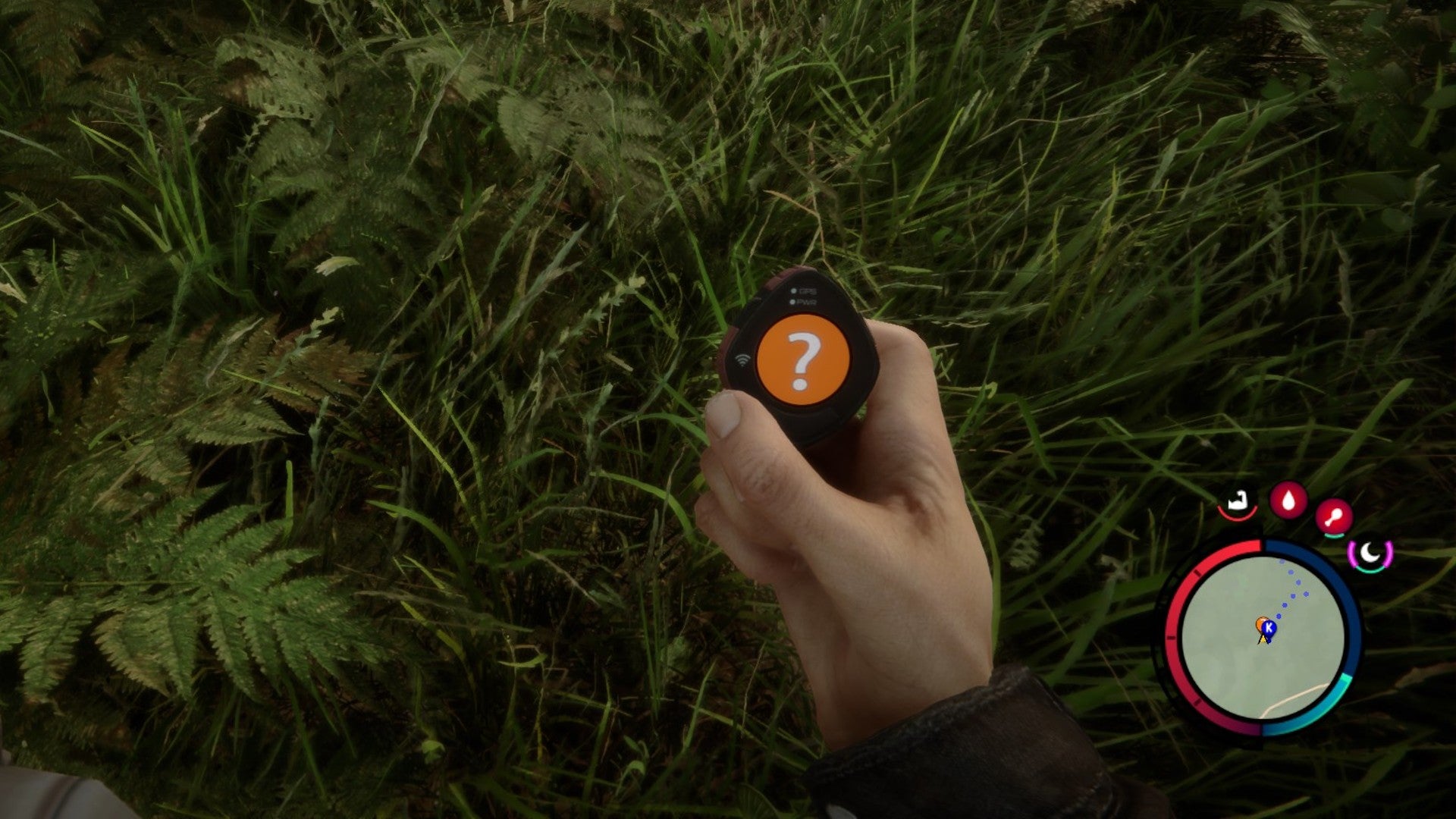 A player stares down at a GPS locator in Sons of the Forest.