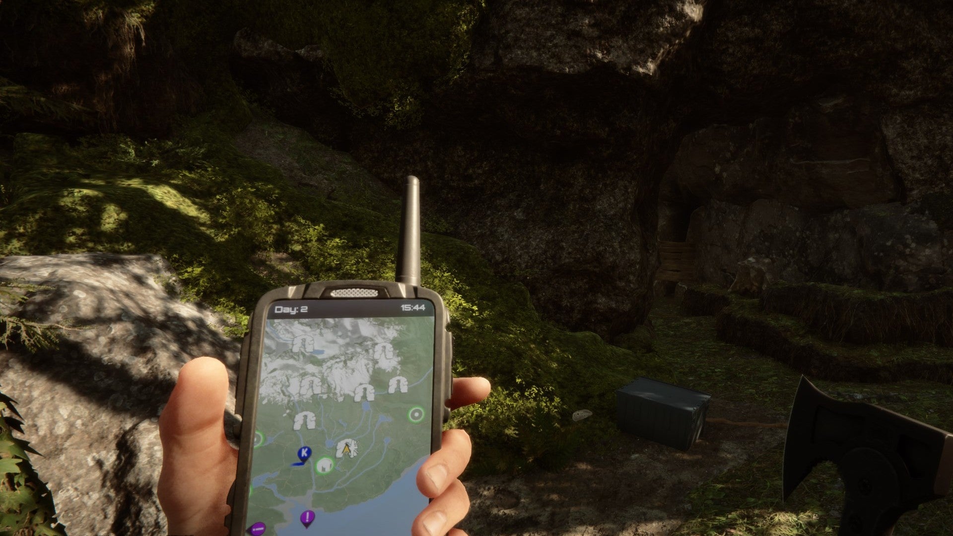 A player stares at their GPS in Sons of the Forest.