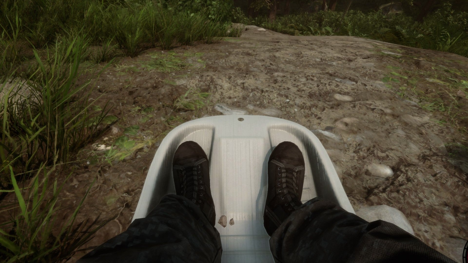 A player slides downhill on a sled in Sons of the Forest.