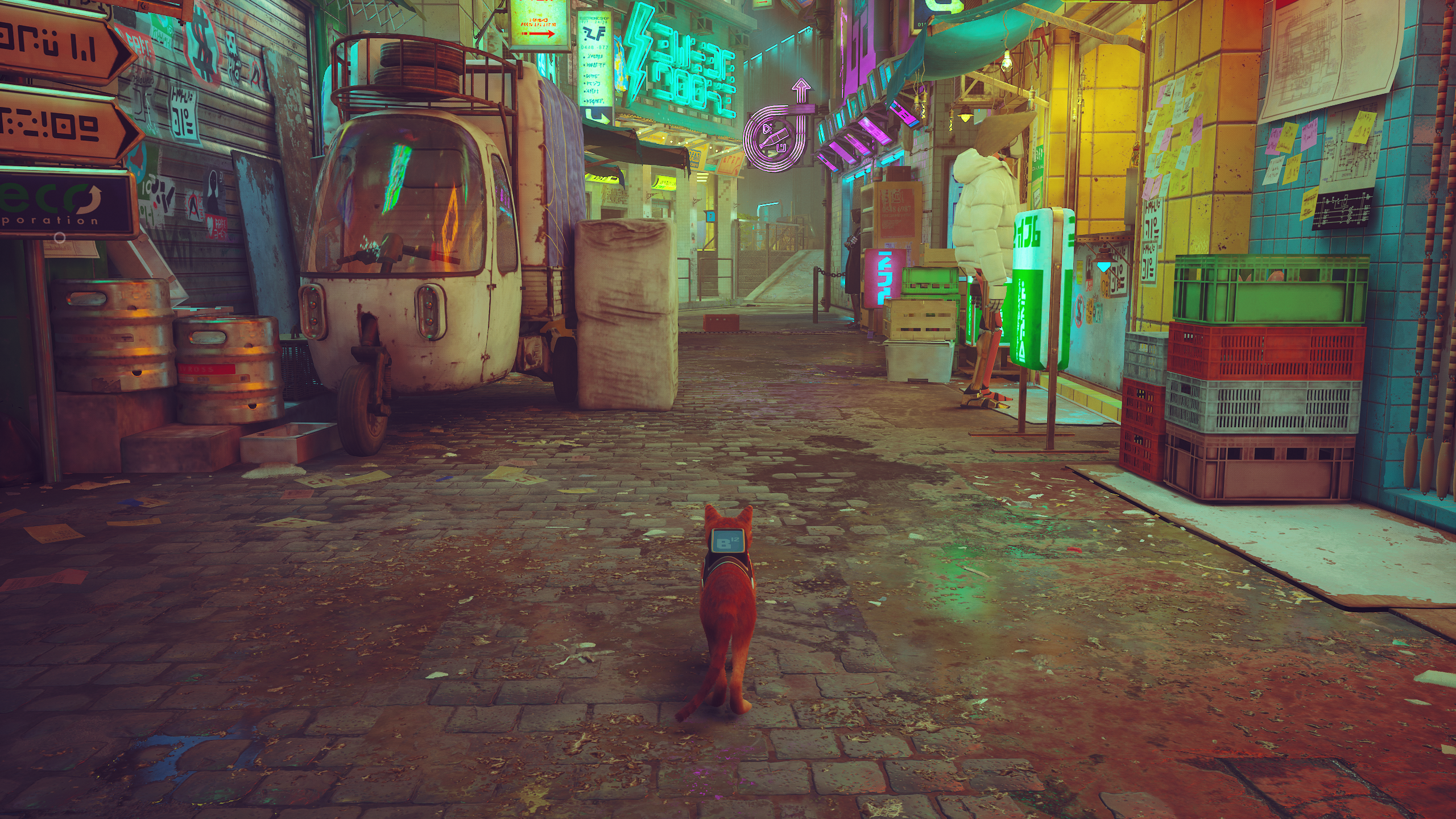 Stray on its Low quality settings, showing a leon-lit street scene.