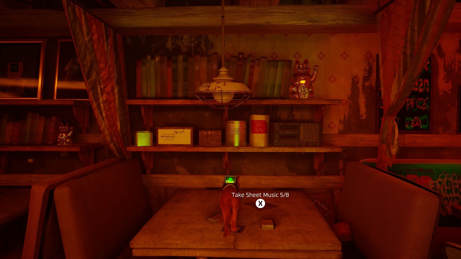 Stray screenshot showing a cat on top of a table in a bar booth. The room is illuminated in a dim red light, and the cat is staring at a piece of sheet music on the table.