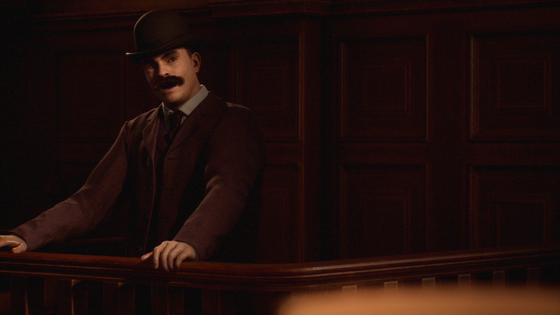 A screenshot from The Devil In Me showing a man in a suit and bowler hat speaking on the stand in a courtroom