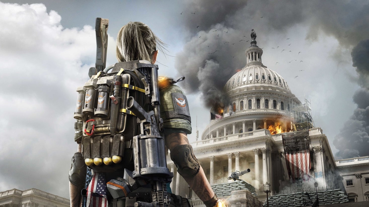 A soldier stares up at the burning capitol building in The Division 2