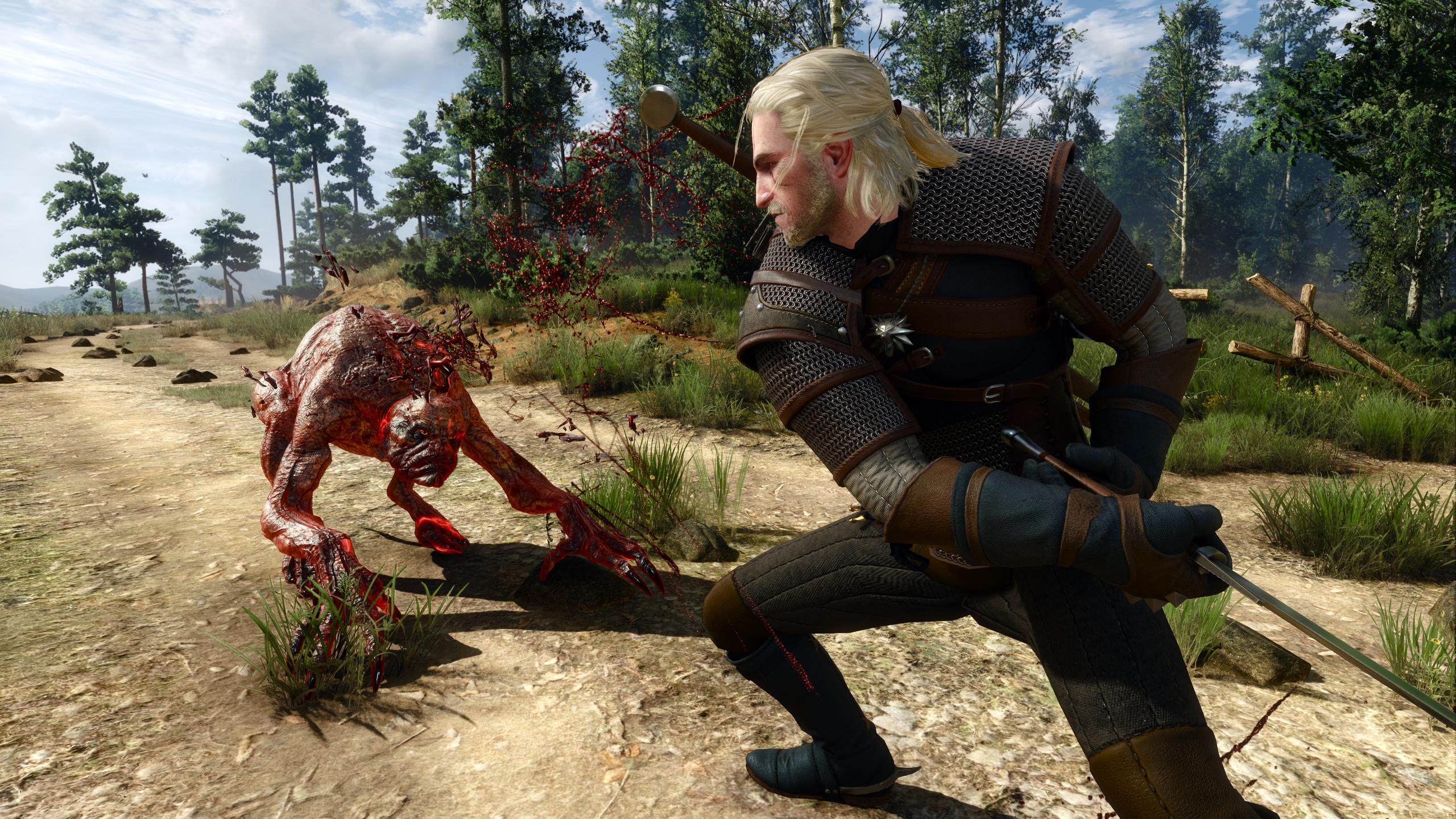 Geralt fights a ghoul in The Witcher 3: Wild Hunt, with ray tracing enabled via the Next Gen update.