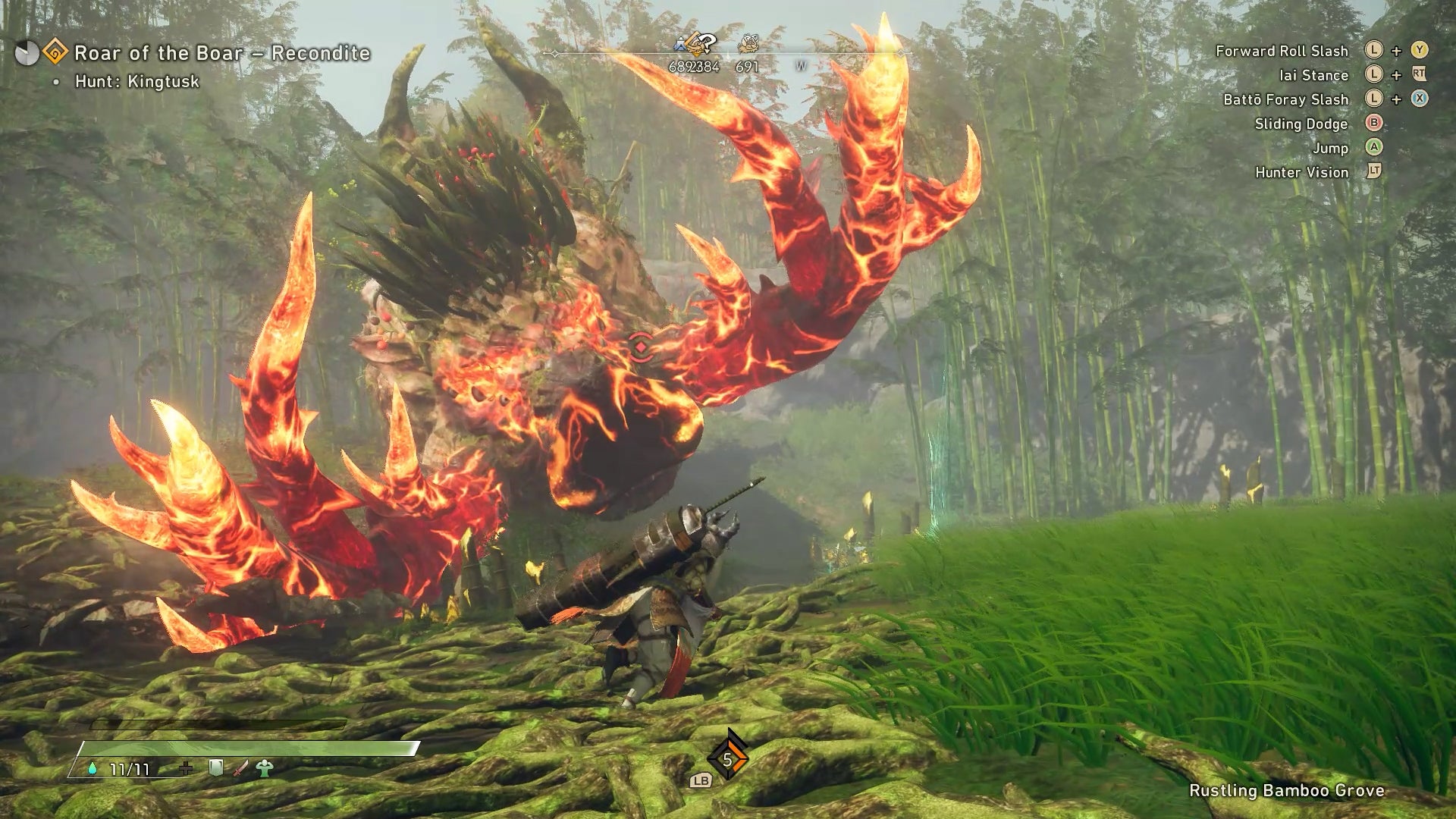 A large pig with flaming tusks charges towards the player in a bamboo forest.