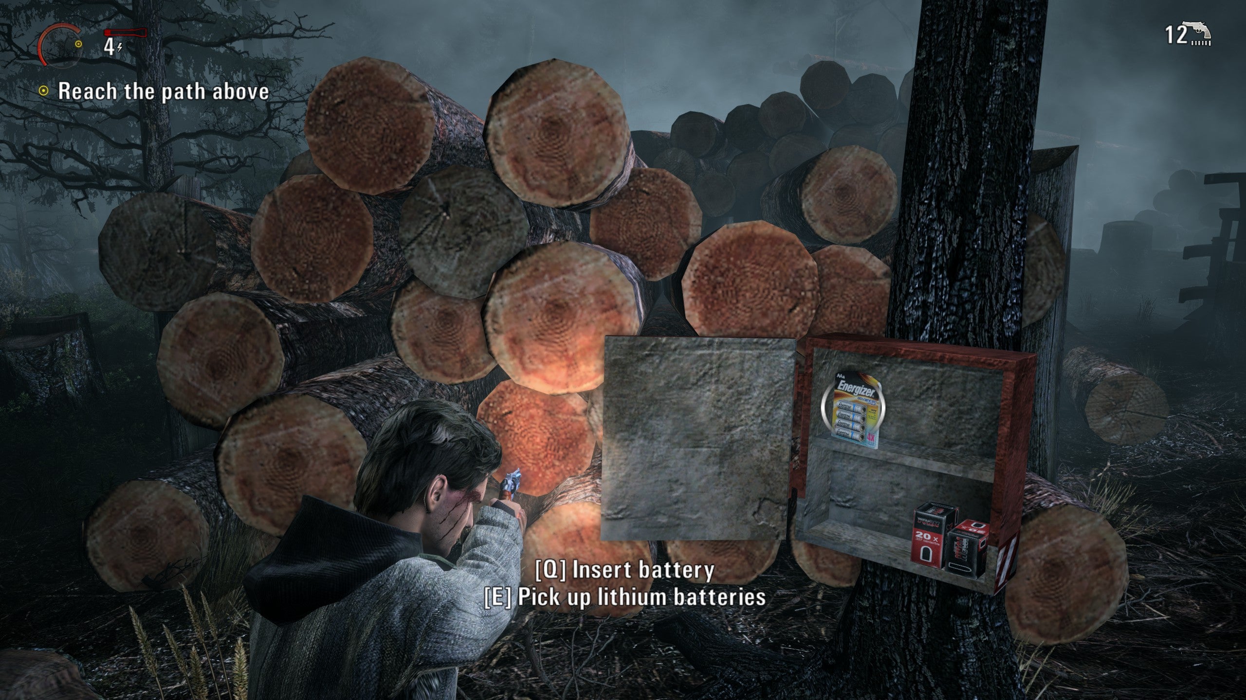 A screenshot of Alan Wake, showing some batteries and ammo in a container.