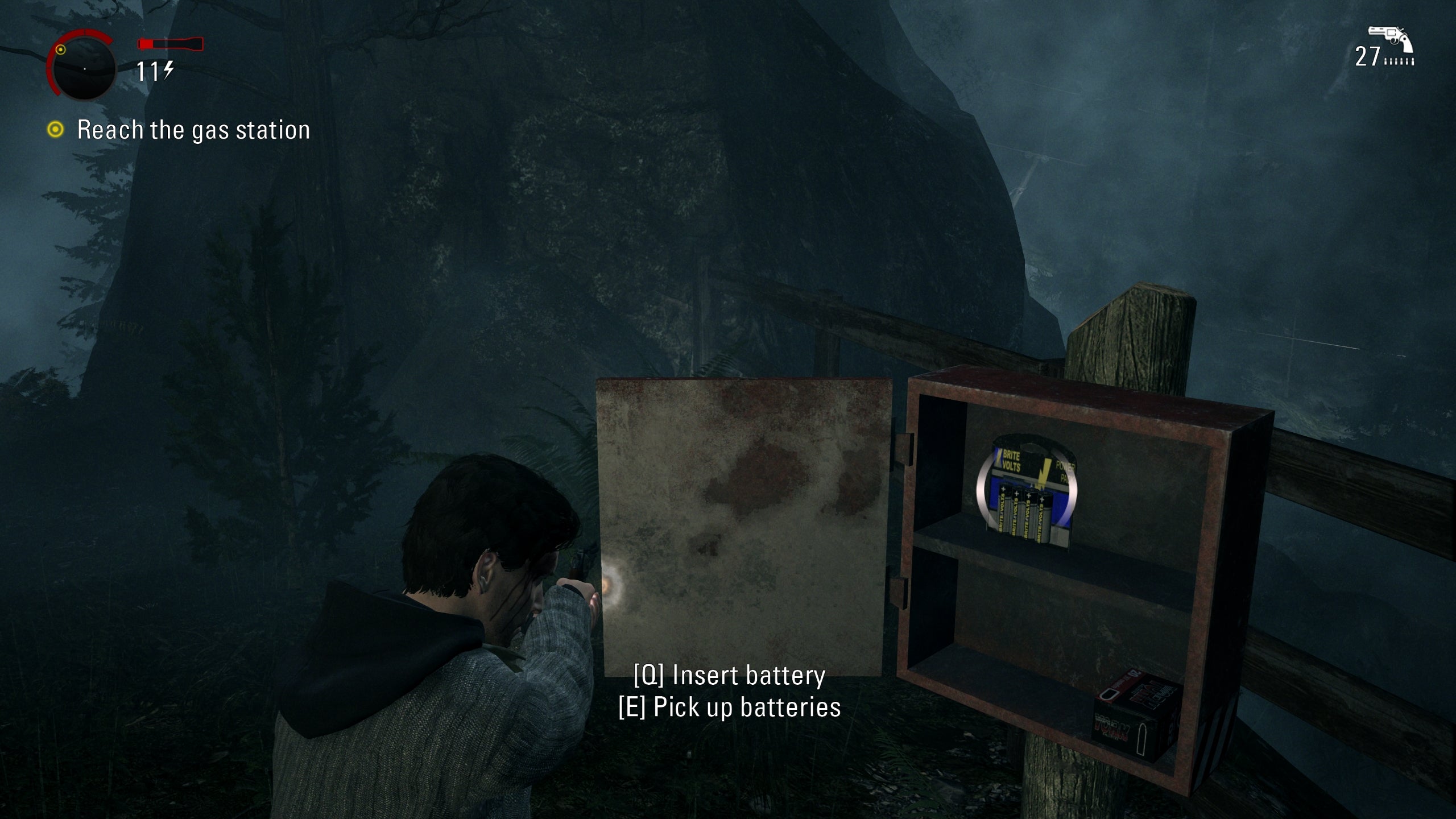 A screenshot of Alan Wake Remastered, showing some batteries and ammo in a container.