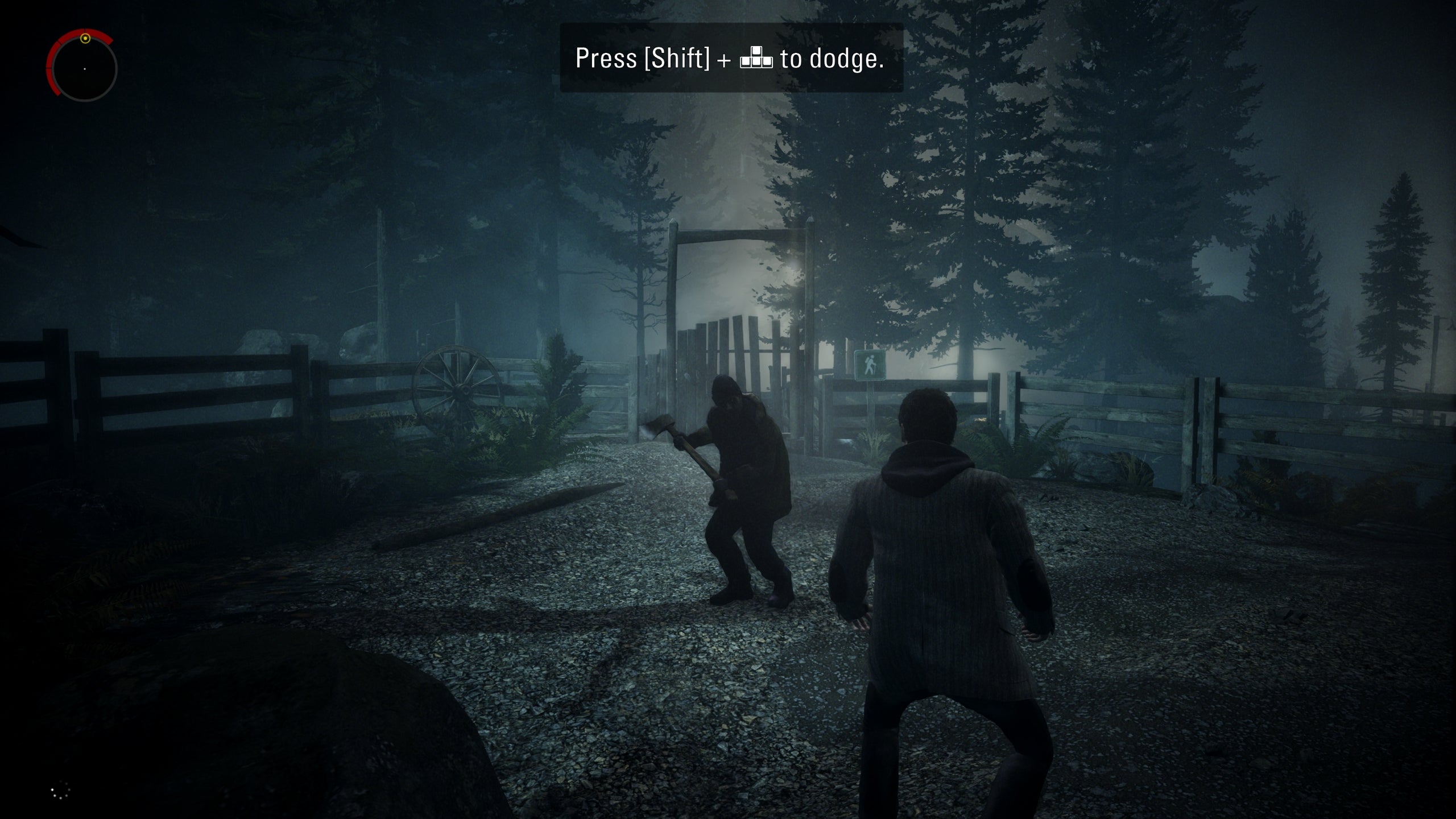 A screenshot of Alan Wake Remastered, showing Alan under attack from a shadowy axe-wielder.