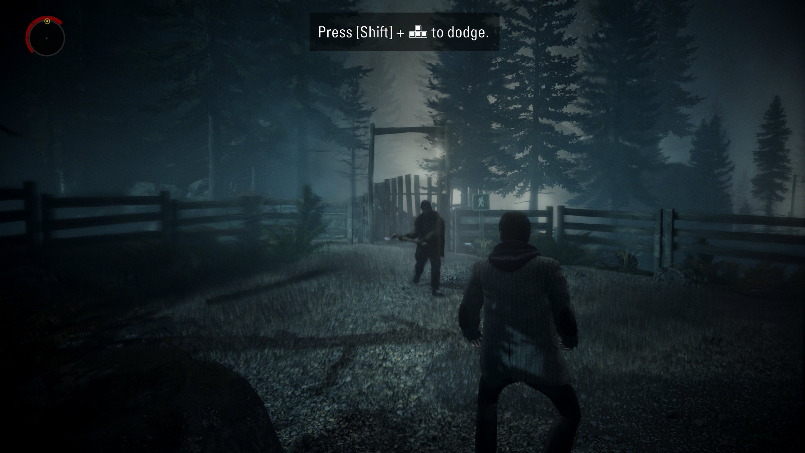 A screenshot of Alan Wake Remastered, showing Alan under attack from a shadowy axe-wielder. Strong motion blur is visible.