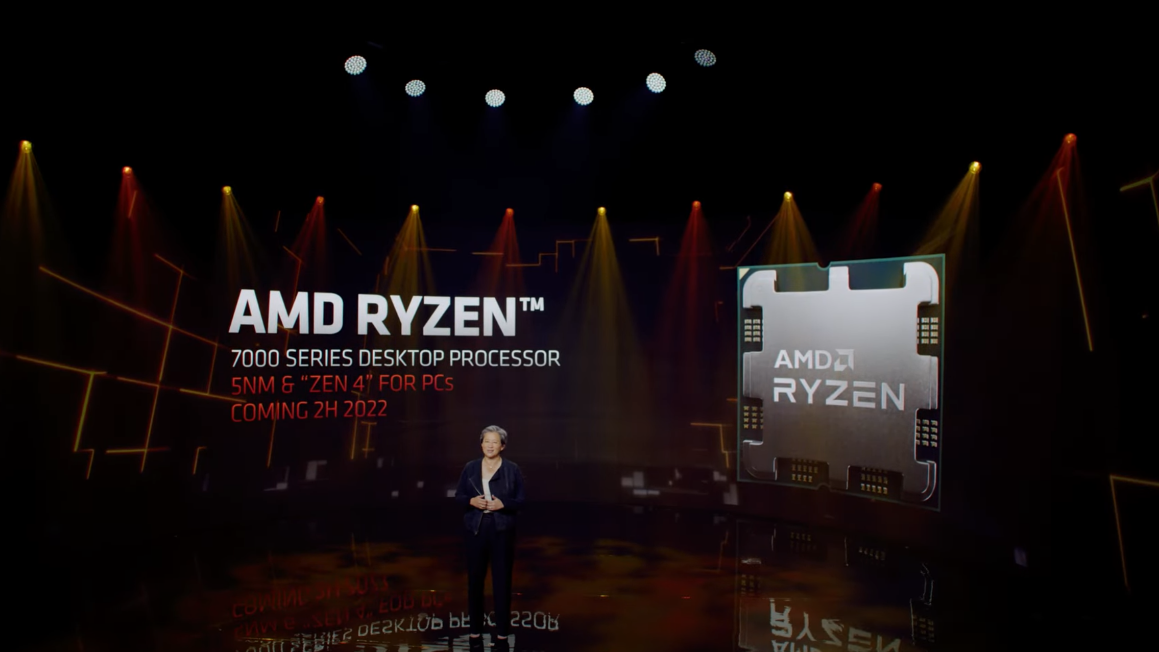 AMD CEO Dr Lisa Su reveals the AMD Ryzen 7000 CPU series on a stage.