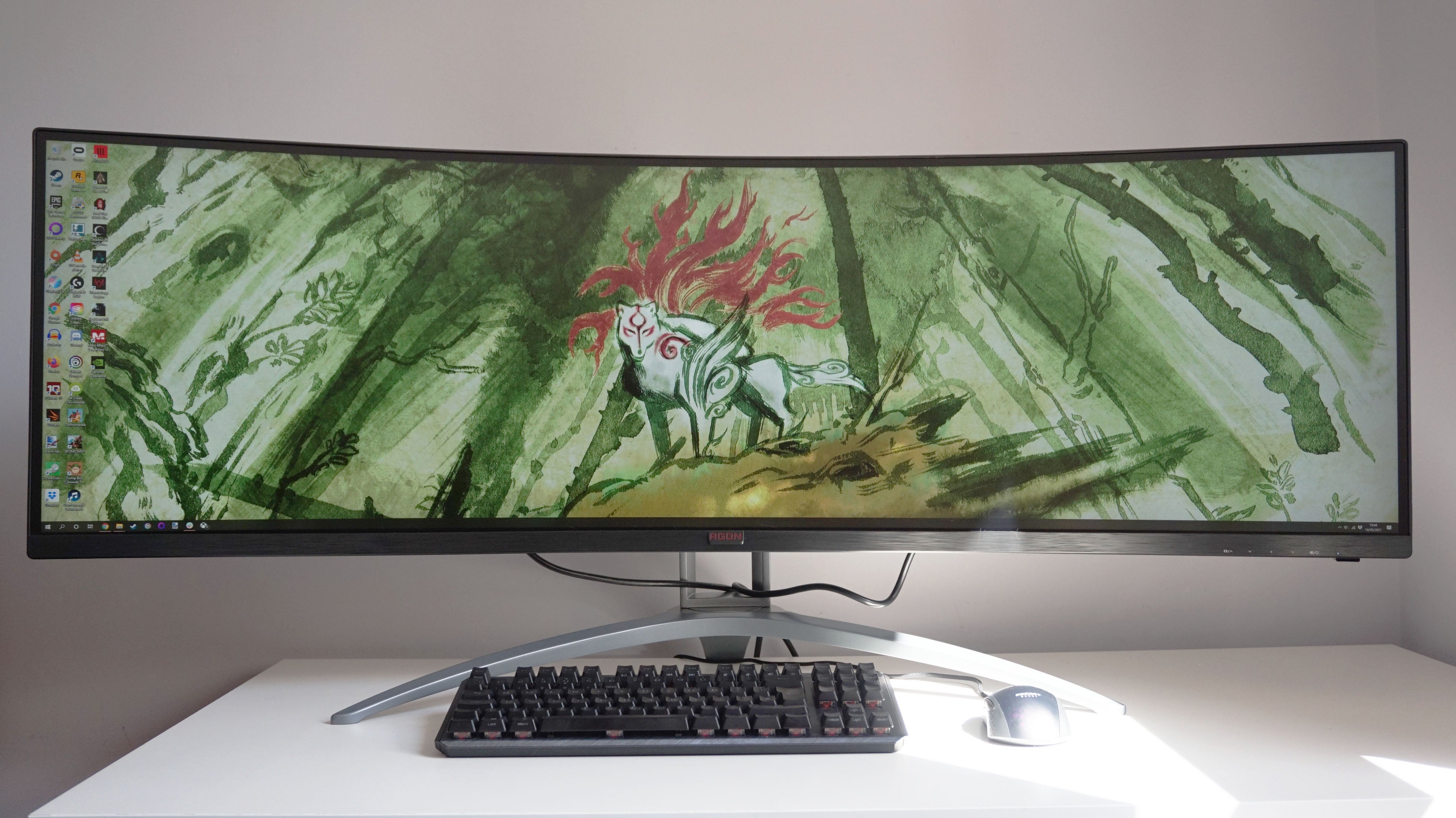 A photo of the AOC Agon AG493UCX gaming monitor