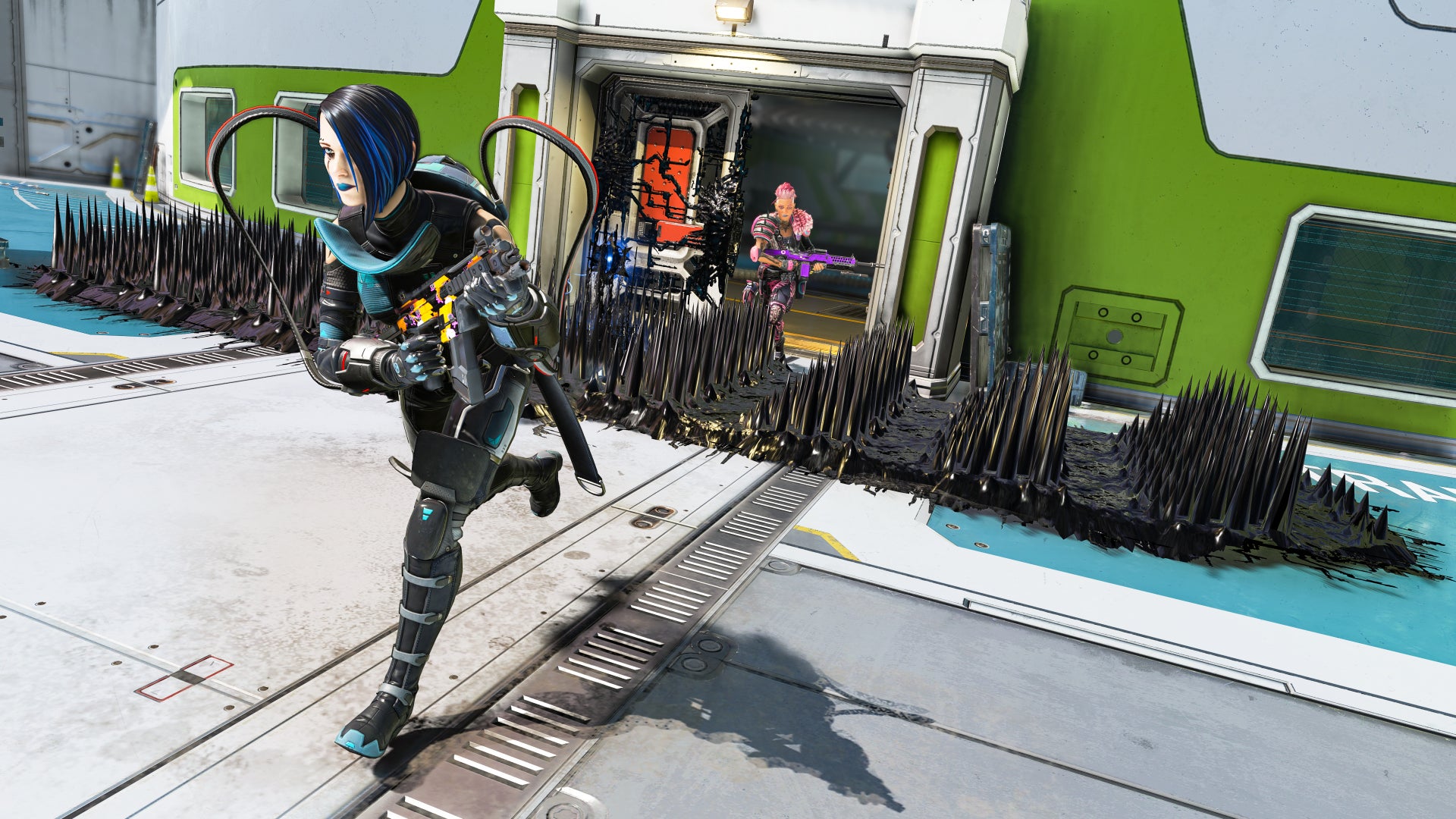 Apex Legends character Catalyst runs towards the camera, leaving behind Piercing Spikes on the floor outside a door which trap an enemy player behind her.