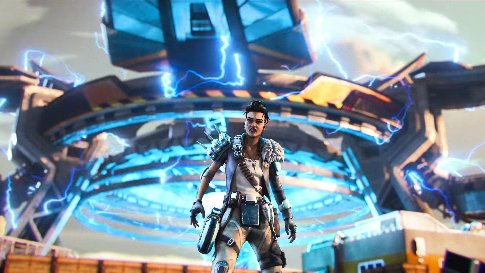 Apex Legends Season 12 Legend, Mad Maggie, in front of a large device that is surging with electricity