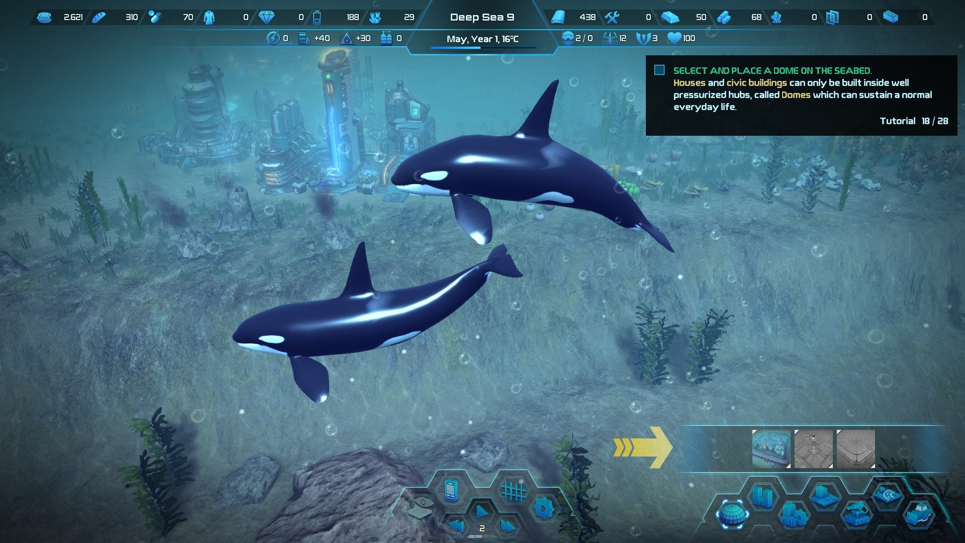 An Aquatico screenshot showing two killer whales swimming past an underwater city