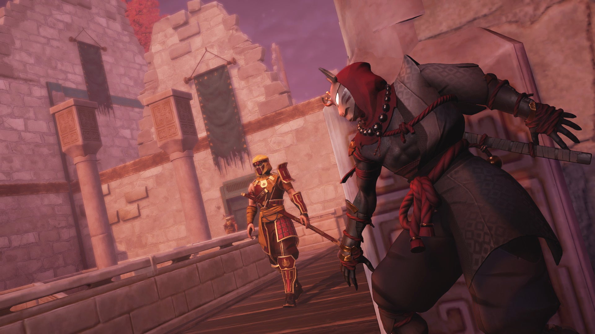 An image from Aragami 2 which shows the player hugging a wall, reading to pounce as a guard approaches.