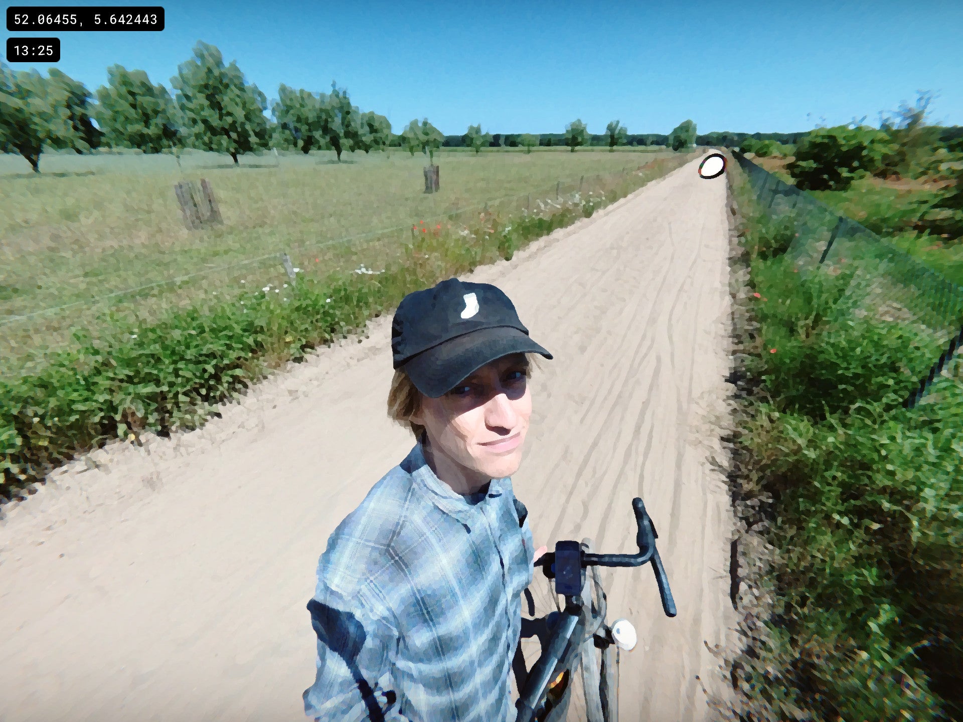 Indie game developer Aran Koning looks upset with a sandy track in an Aran's Bike Trip screenshot.