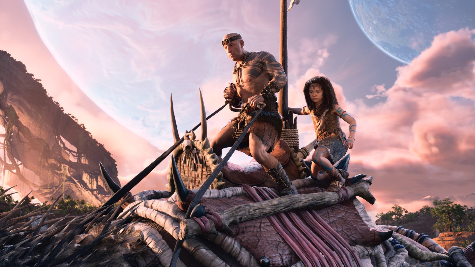 A promotional screenshot for ARK 2, featuring Vin Diesel's character Santiago and the young child he cares for, riding atop a giant dinosaur mount.
