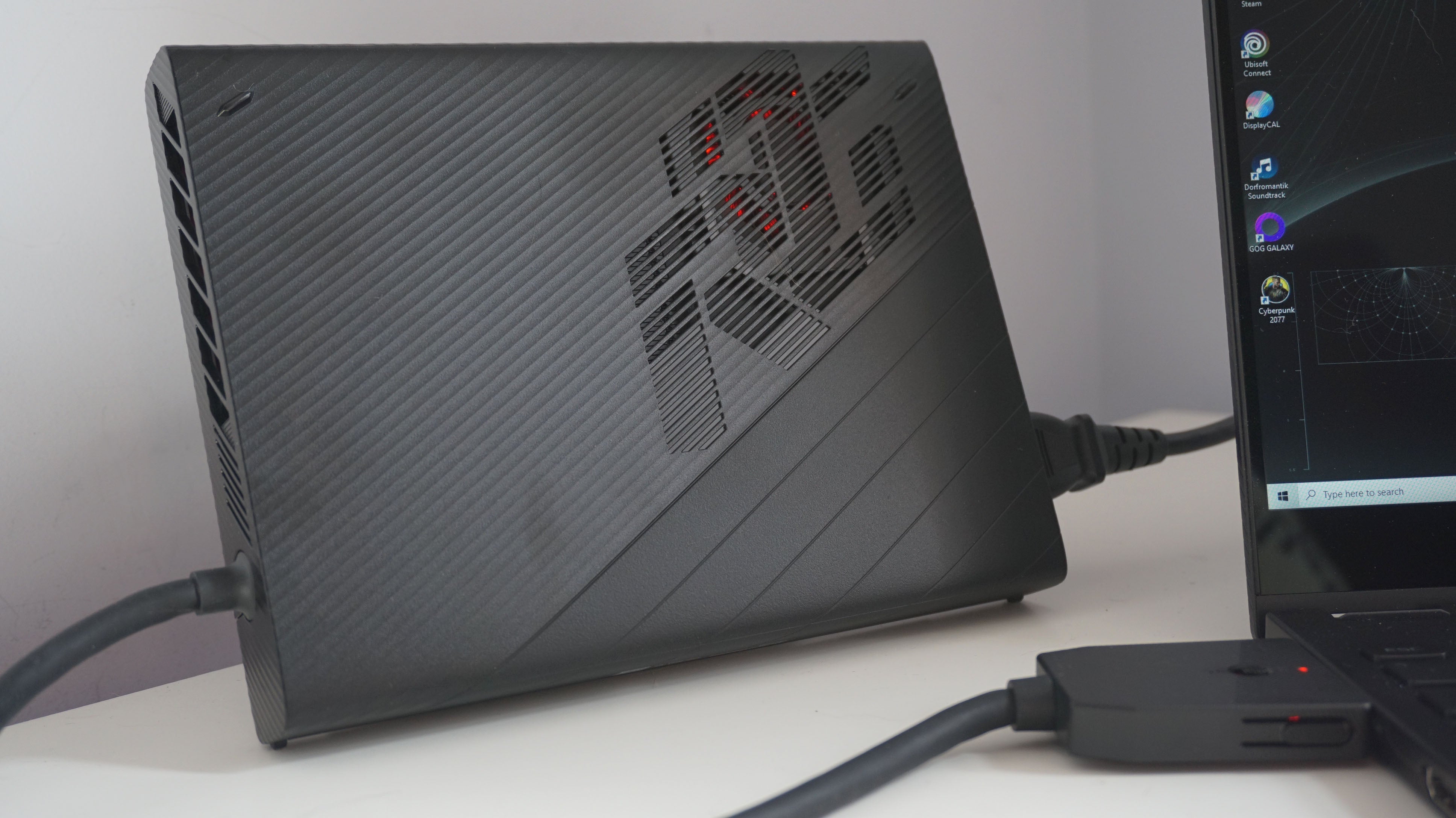 A close-up of the Asus ROG Flow X13 gaming laptop's XG Mobile eGPU