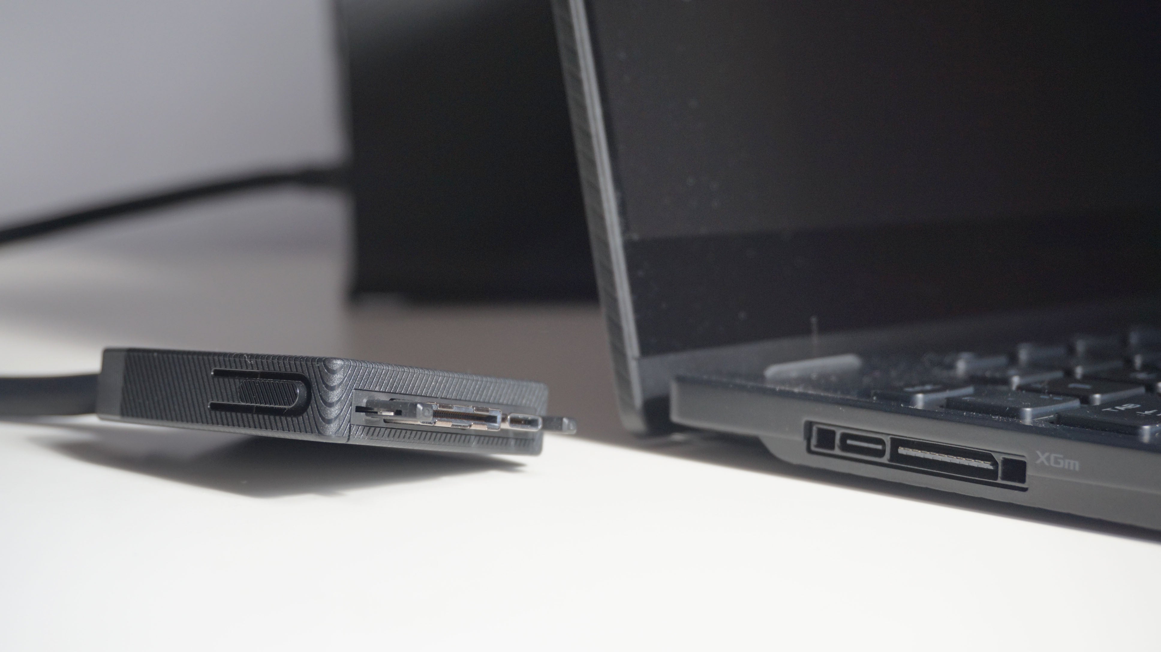 A close-up of the Asus ROG Flow X13 gaming laptop's XG Mobile connection
