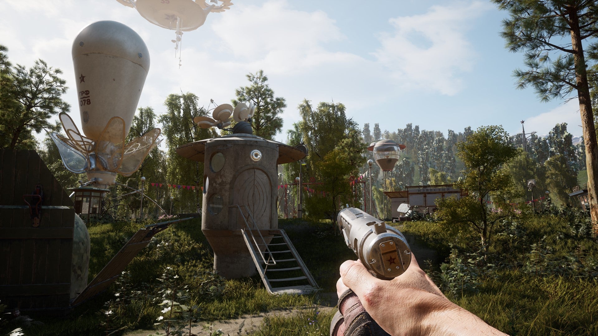 A screenshot from Atomic Heart which shows the player exploring the open world, holding a pistol up to a steely silo among the trees.