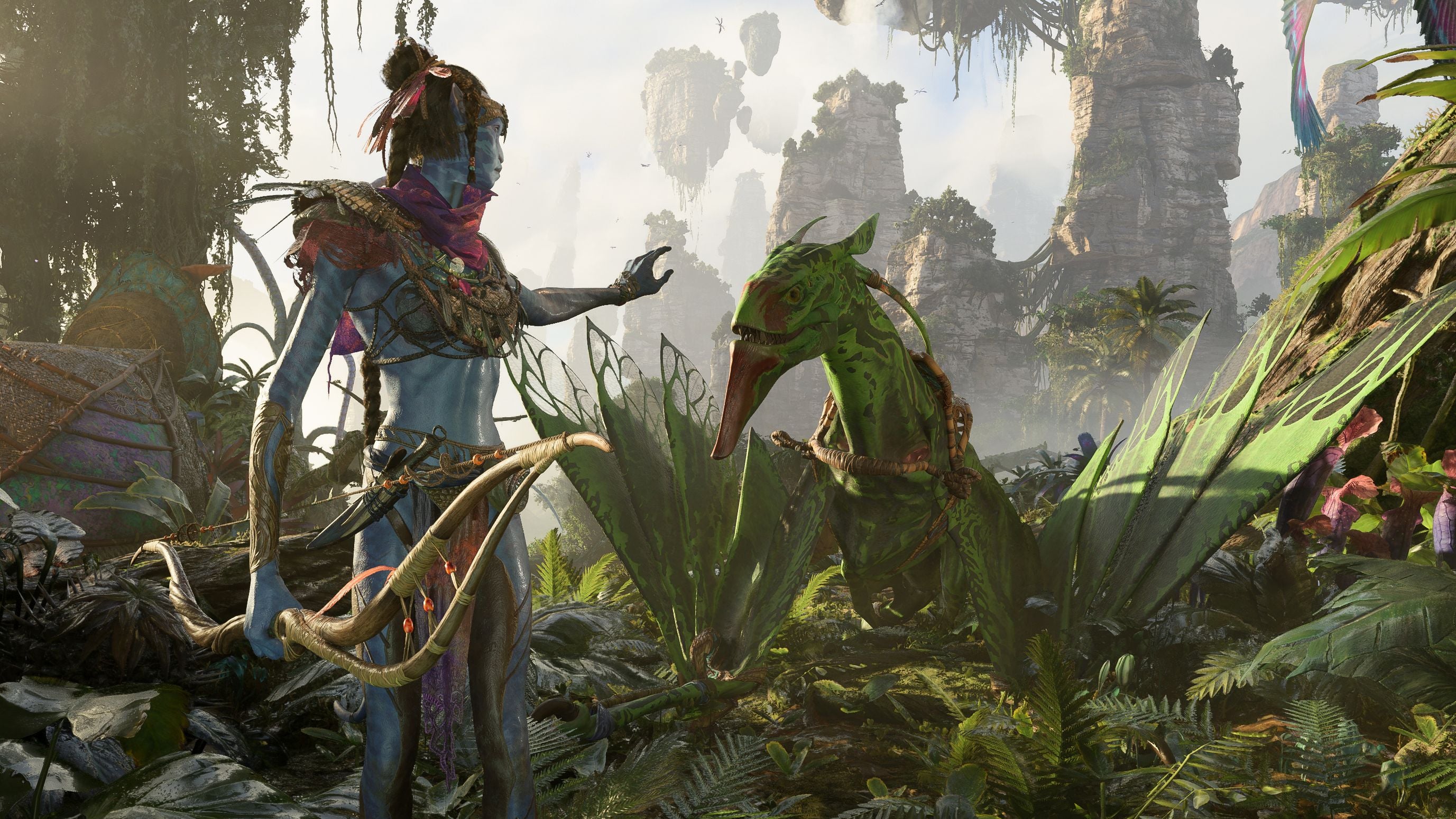 A Na'vi warrior befriending a banshee - a green flying lizard pal - in a screenshot from the Avatar Frontiers Of Pandora game